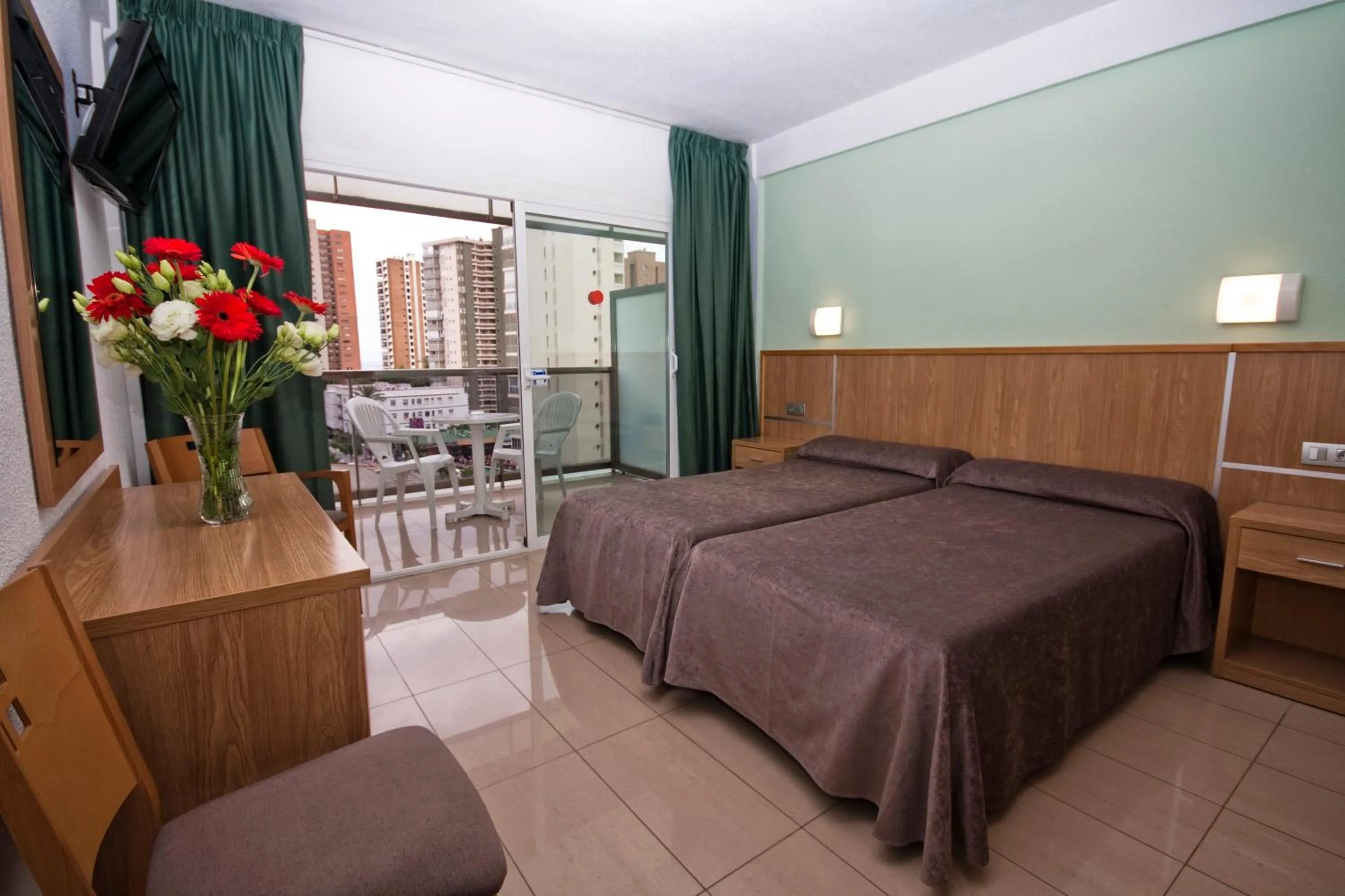 Twin Room with Pool View in Hotel Perla