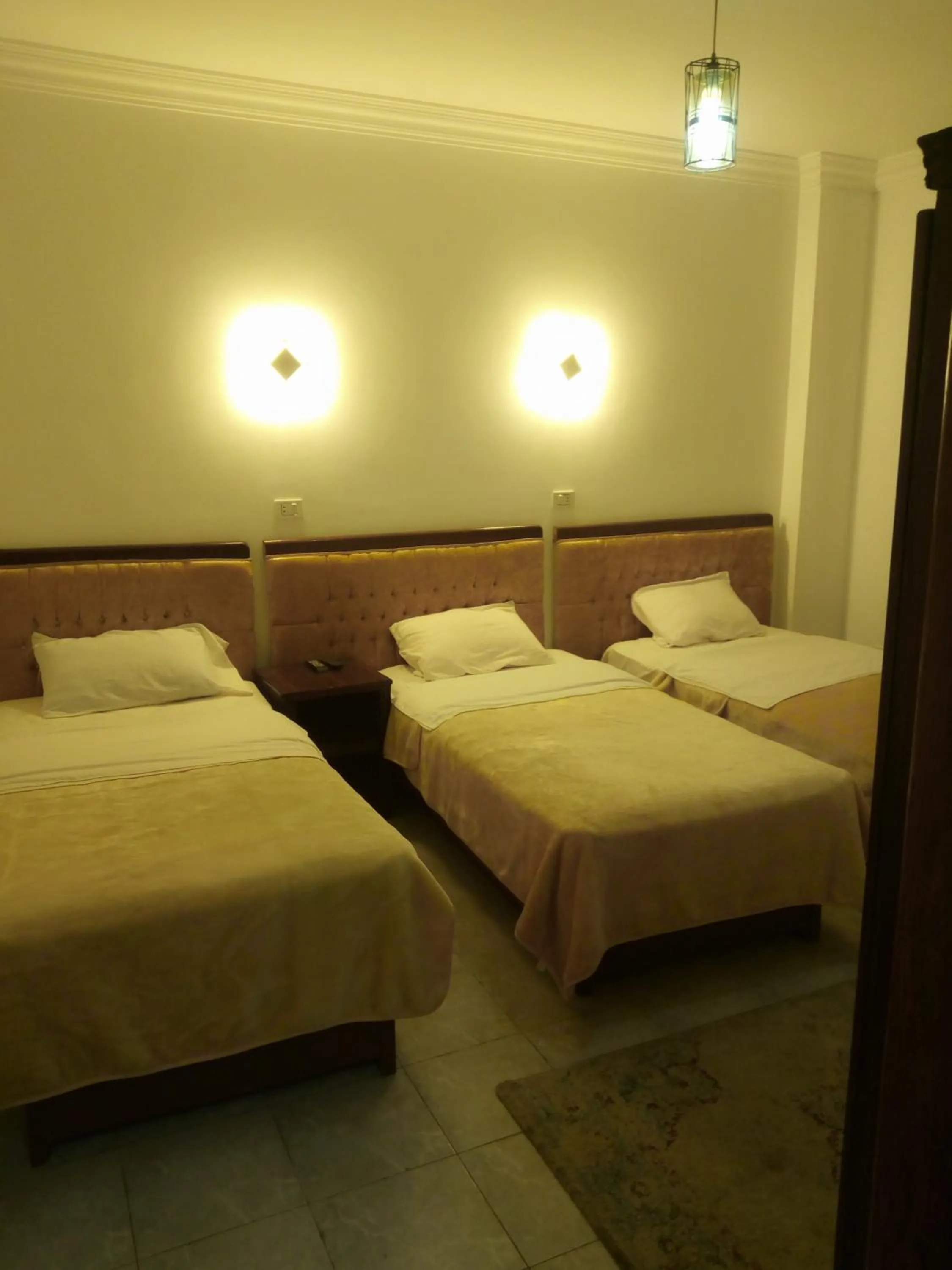 Deluxe Triple Room in Arabian Nights Hostel