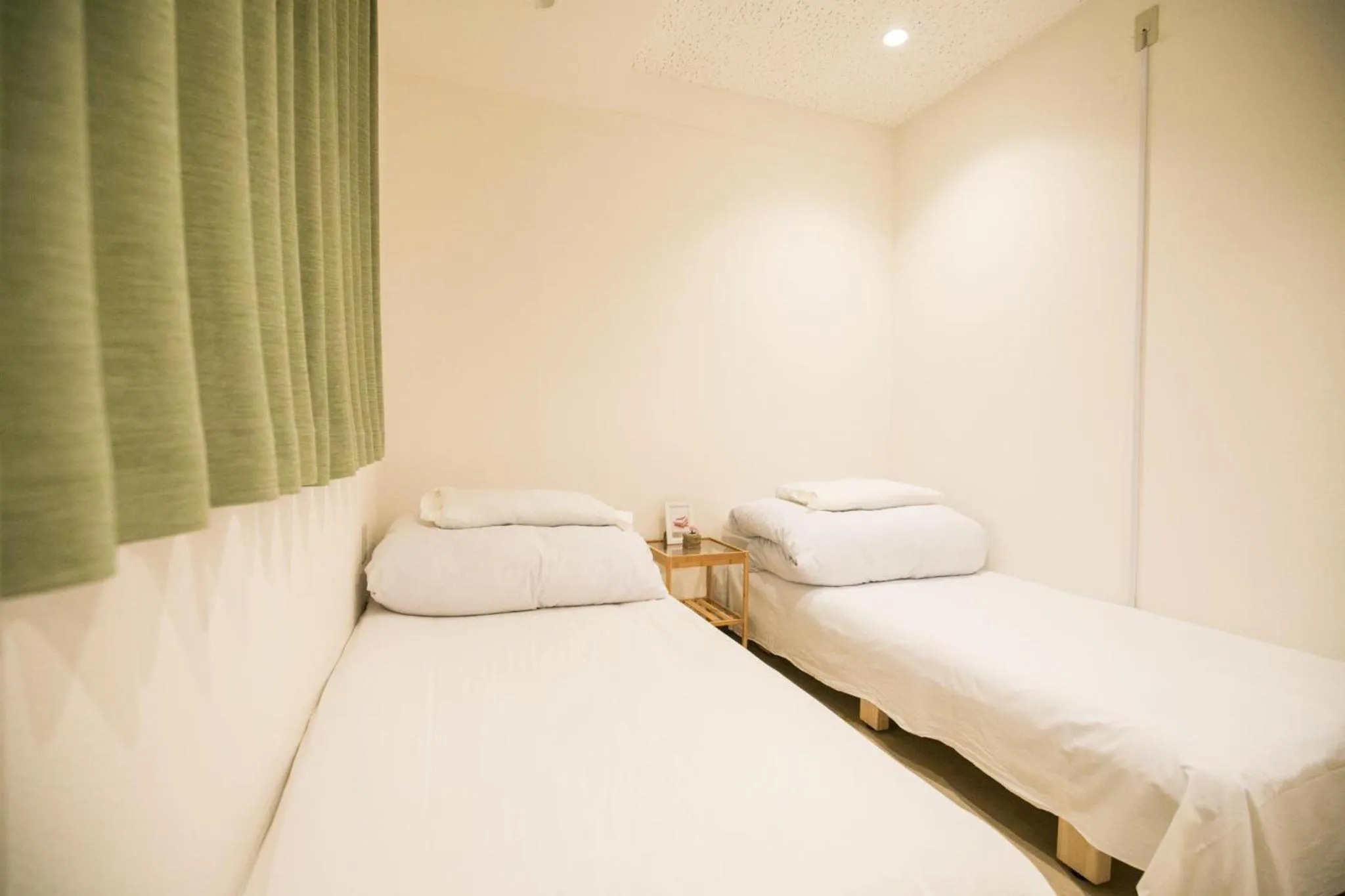 Twin Room with Shared Bathroom - E in 123 Guesthouse