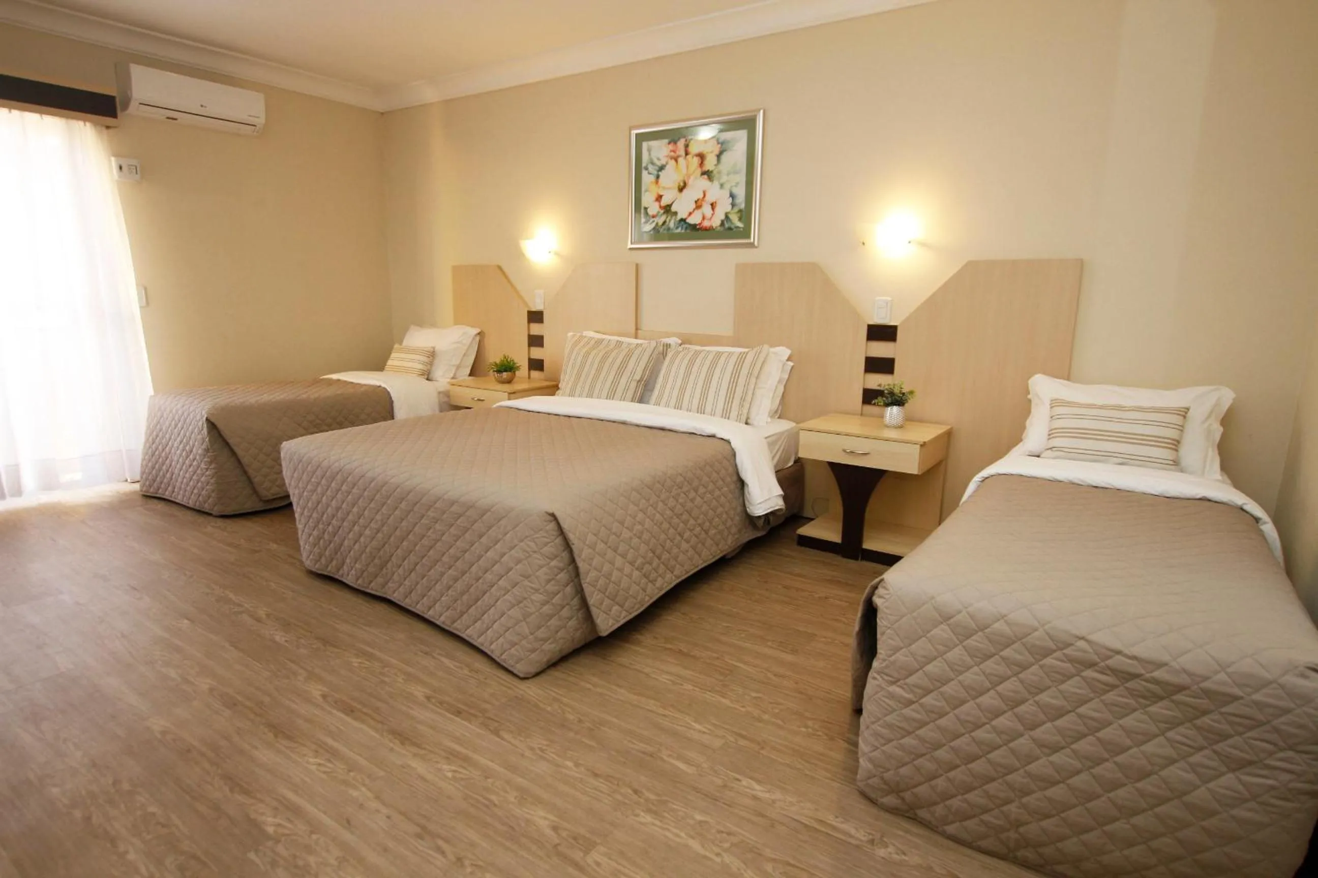 Deluxe Quadruple Room in Sky Ville Hotel Canela