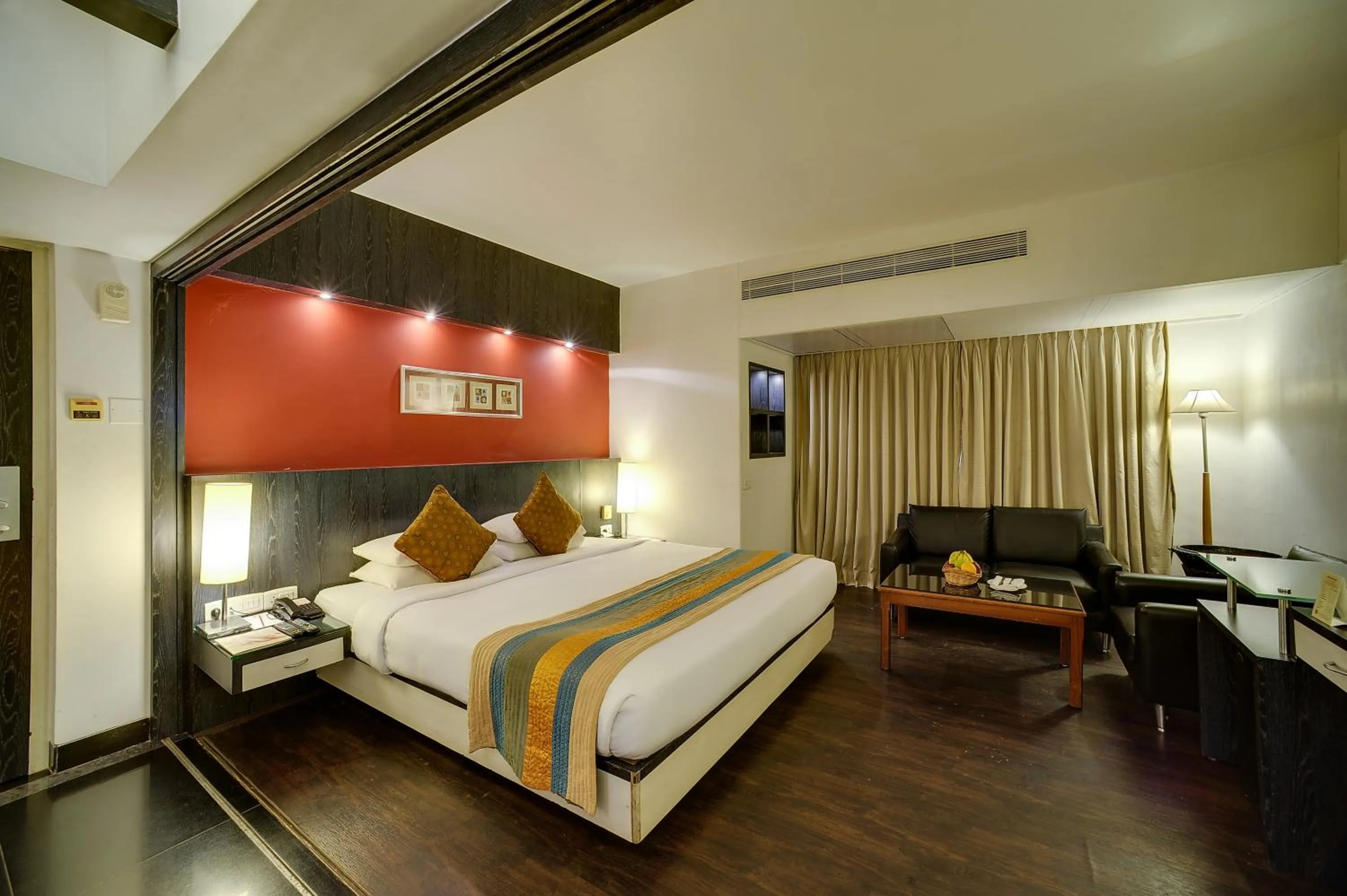 Suite room with chef’s choice veg/non-veg platter, Fruit Basket, Airport Pick up & drop in Ramee Guestline Hotel Khar