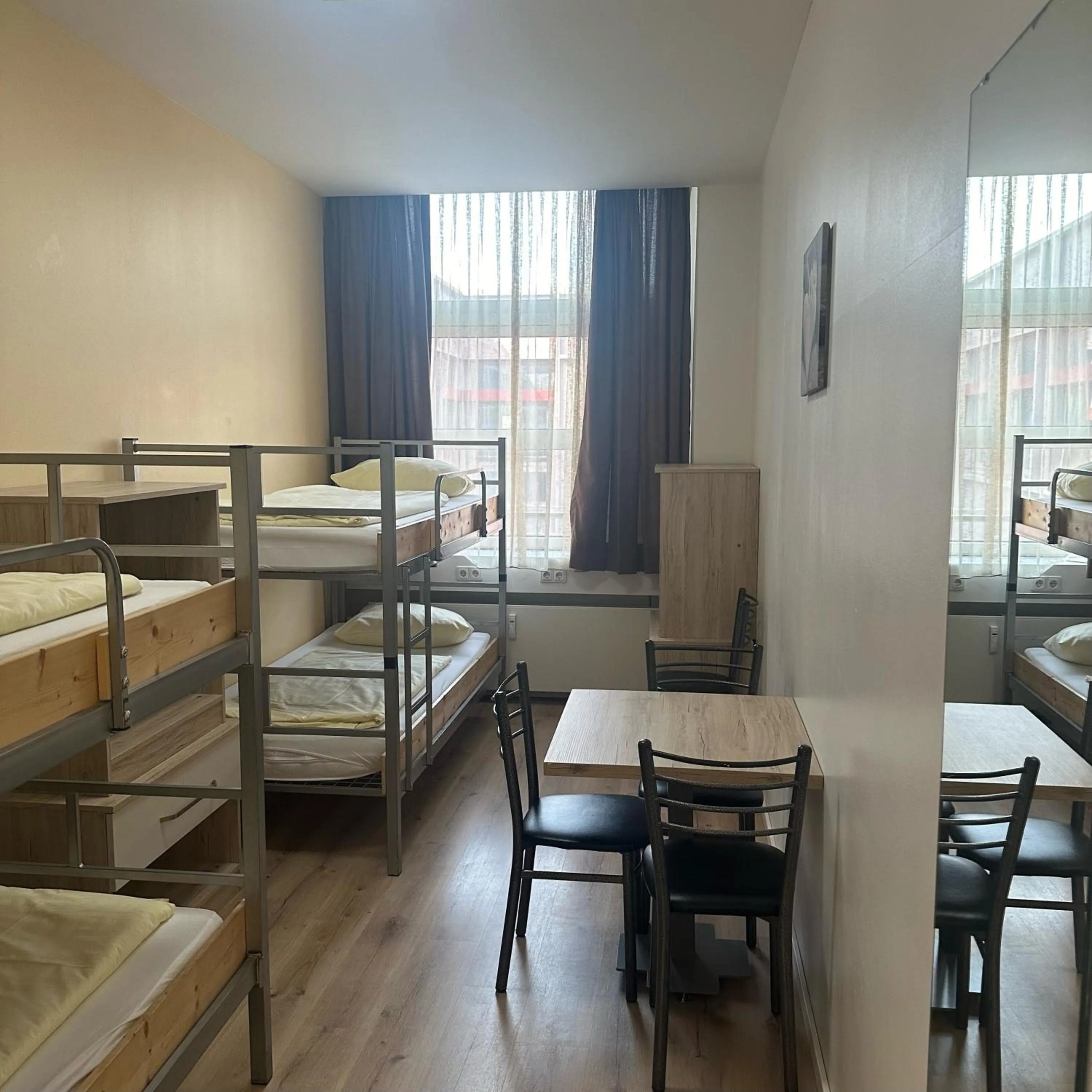 Economy Quadruple Room with Shared Bathroom in Low Budget Hostel