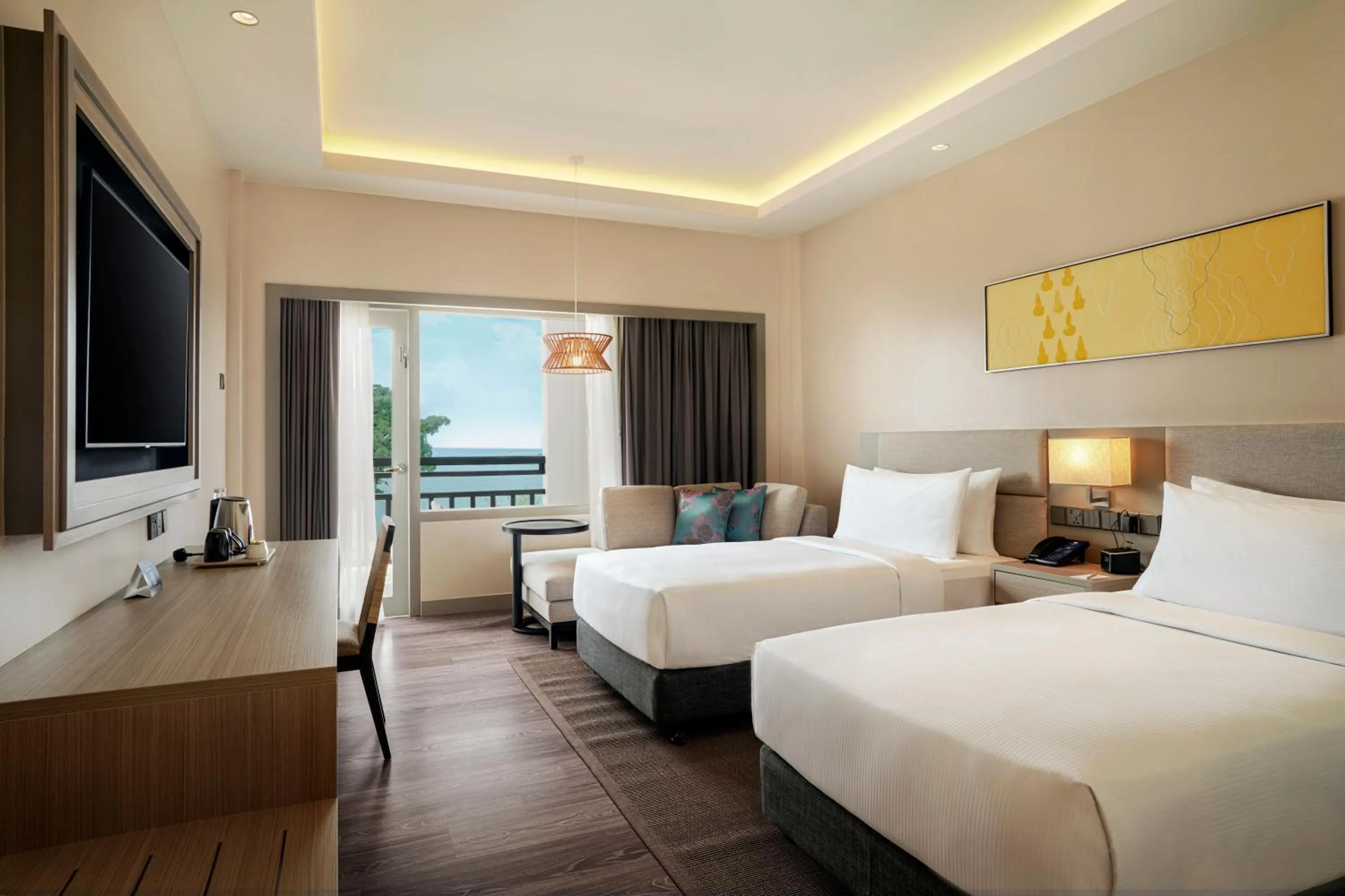 Twin Guest Room with Sea View and Balcony in DoubleTree by Hilton Damai Laut