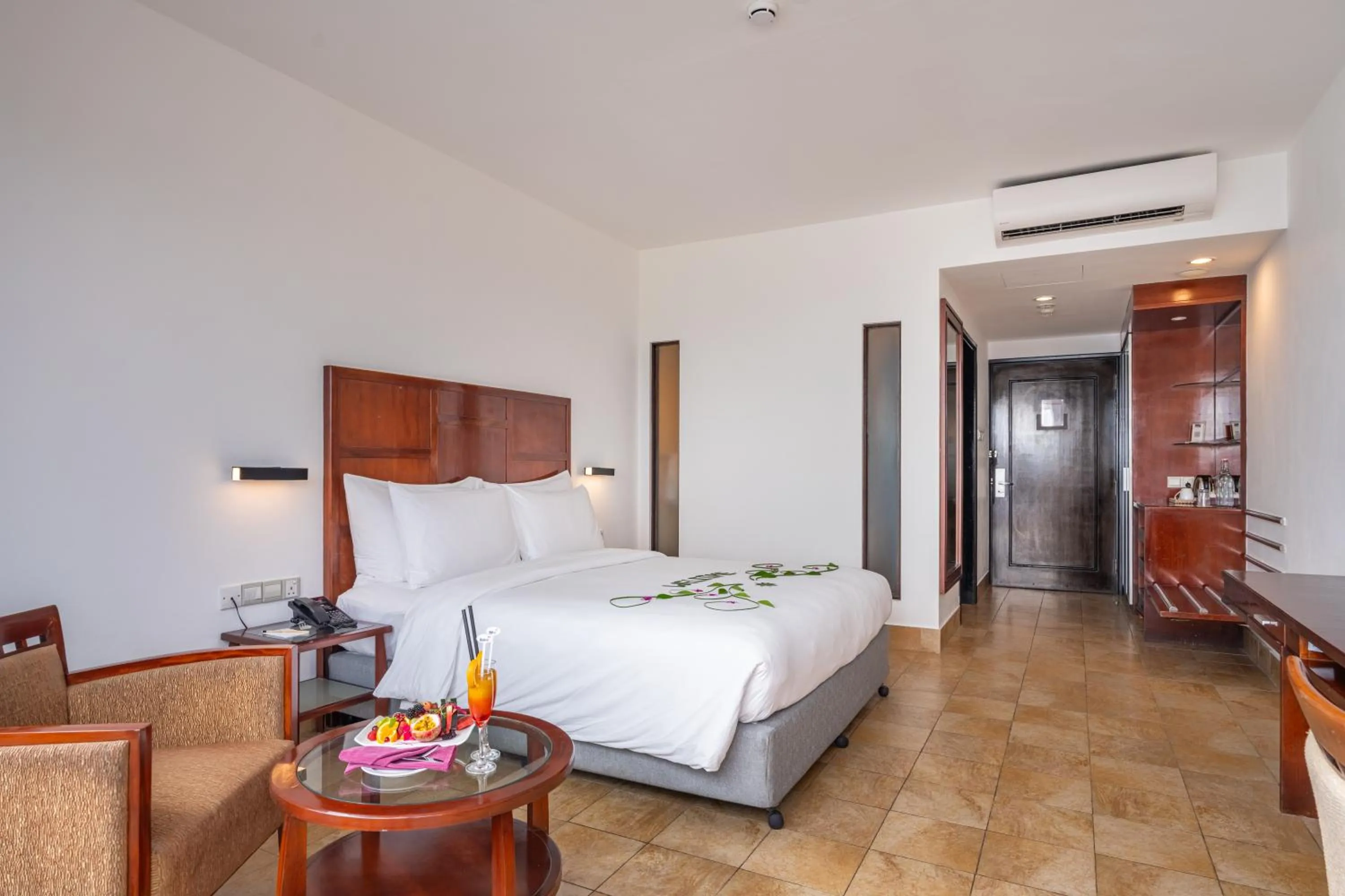 Deluxe Garden View in Hulhule Island Hotel- Private Beach Access & Airport Pick-up and Drop