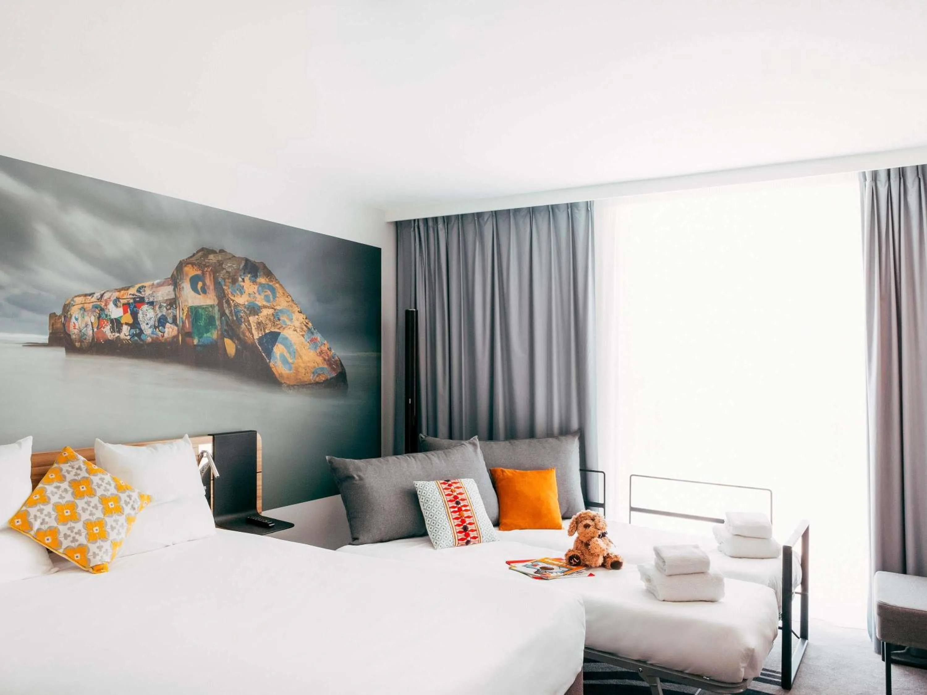 Classic  Family Room with Double Bed and Two Single Beds in Novotel Paris Coeur d'Orly Airport