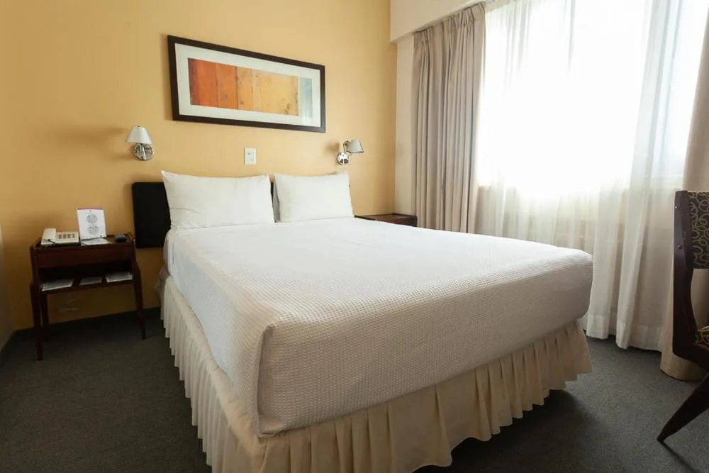 Economy Quadruple Room with Shared Bathroom in Austral Express