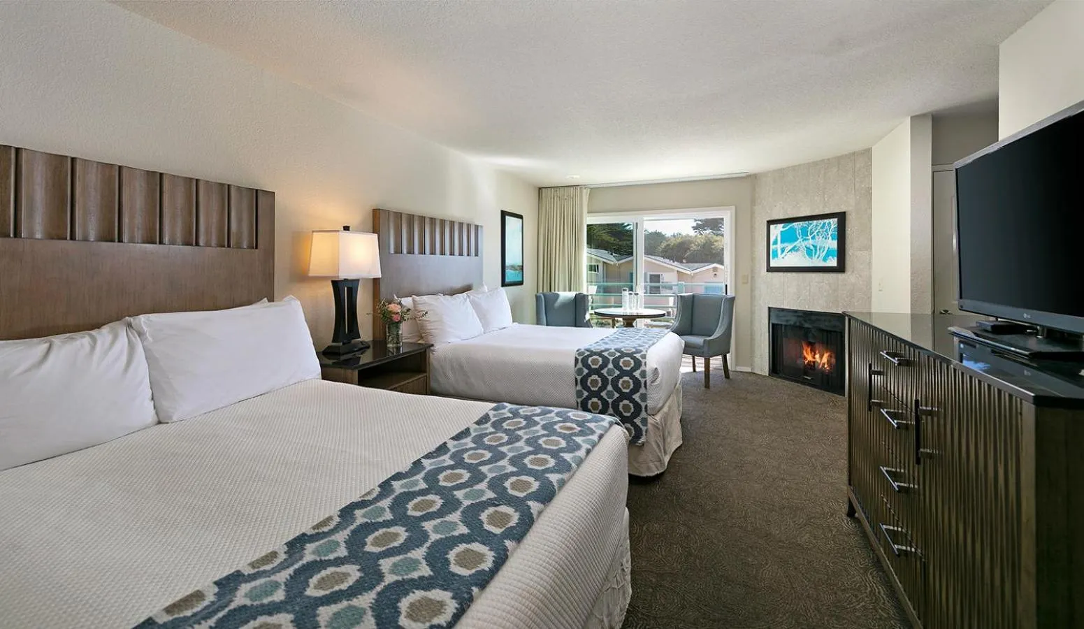 Queen Room with Two Queen Beds - Partial View in Cambria Landing Inn and Suites