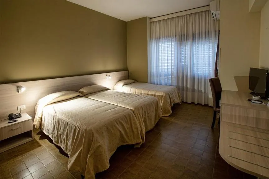 Triple Room in Hotel Scacciapensieri