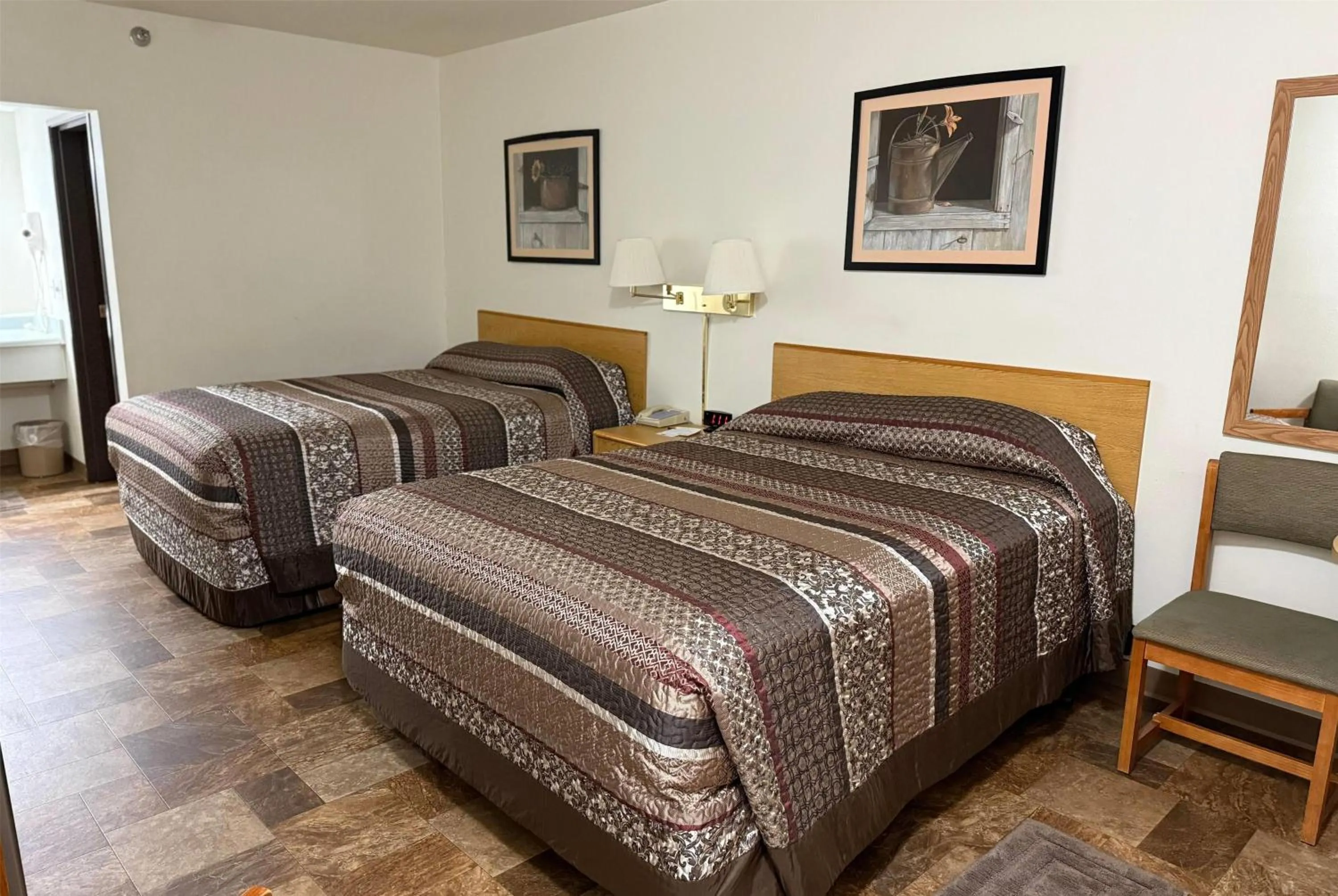 Queen Room with Two Queen Beds - Pet Friendly/Non-Smoking in Travelodge by Wyndham Deadwood