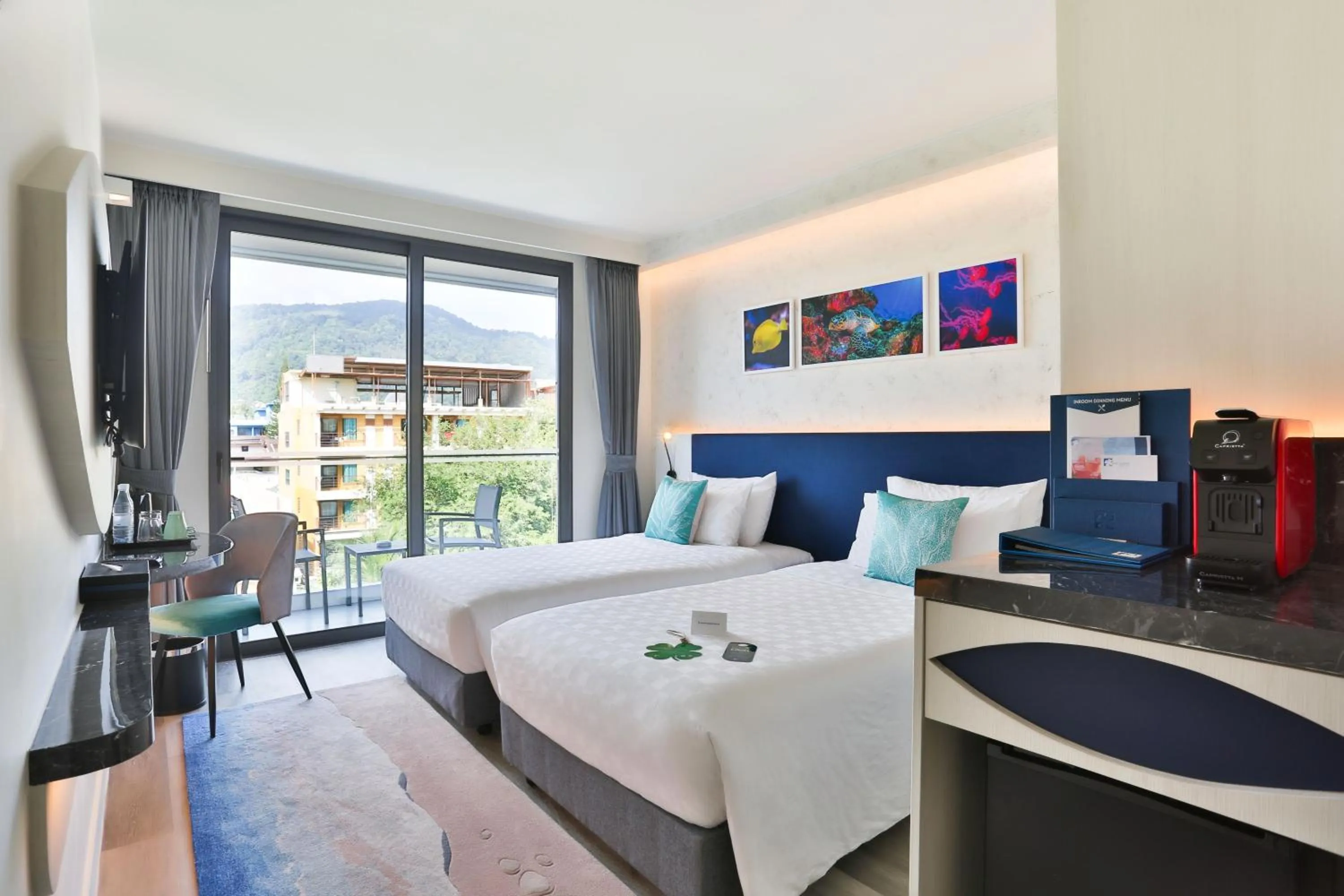 Quadruple Room with Balcony in Hotel Clover Patong Phuket - SHA Plus