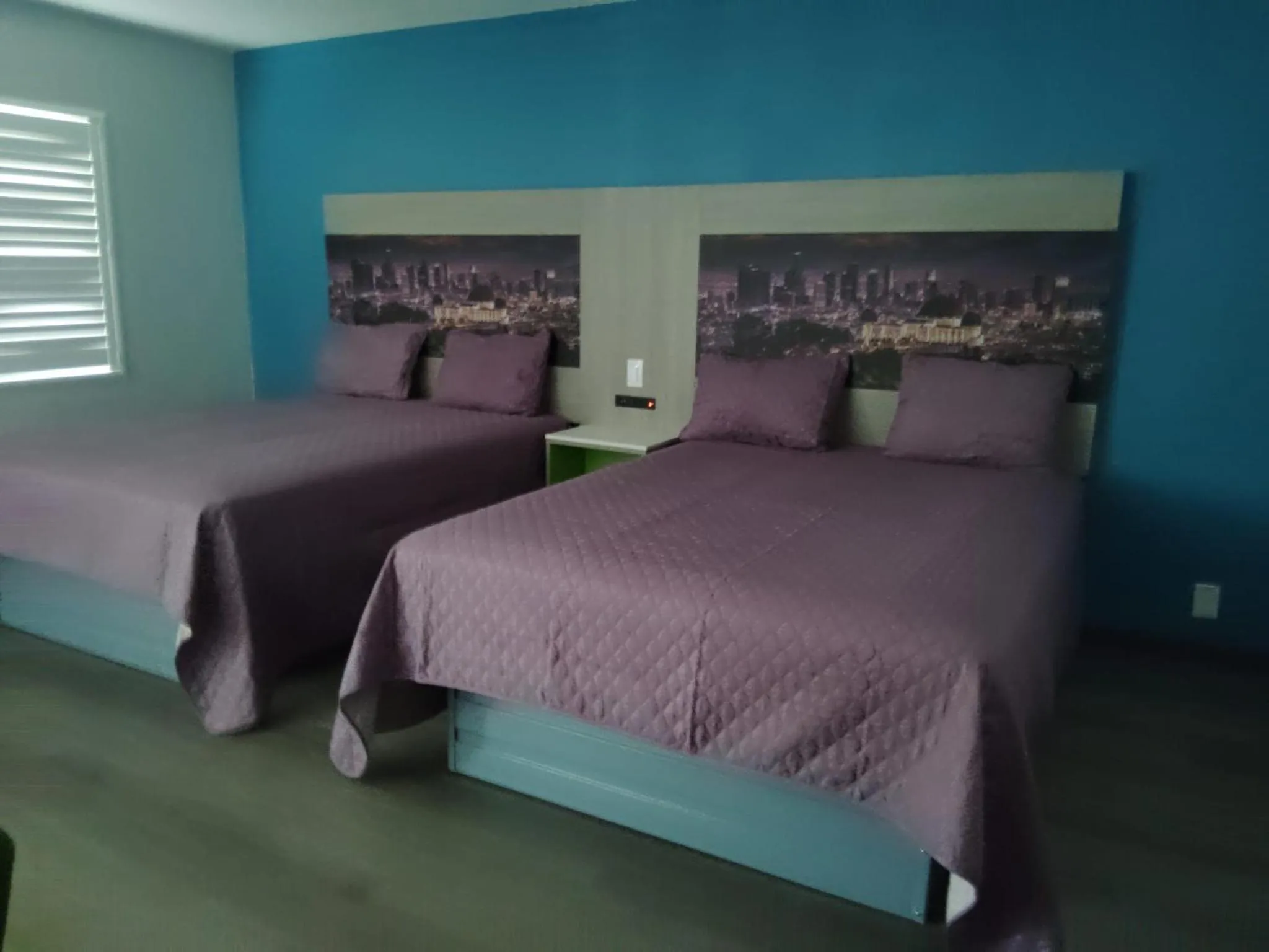 Queen Room with Two Queen Beds in Hi-Way Host Motel