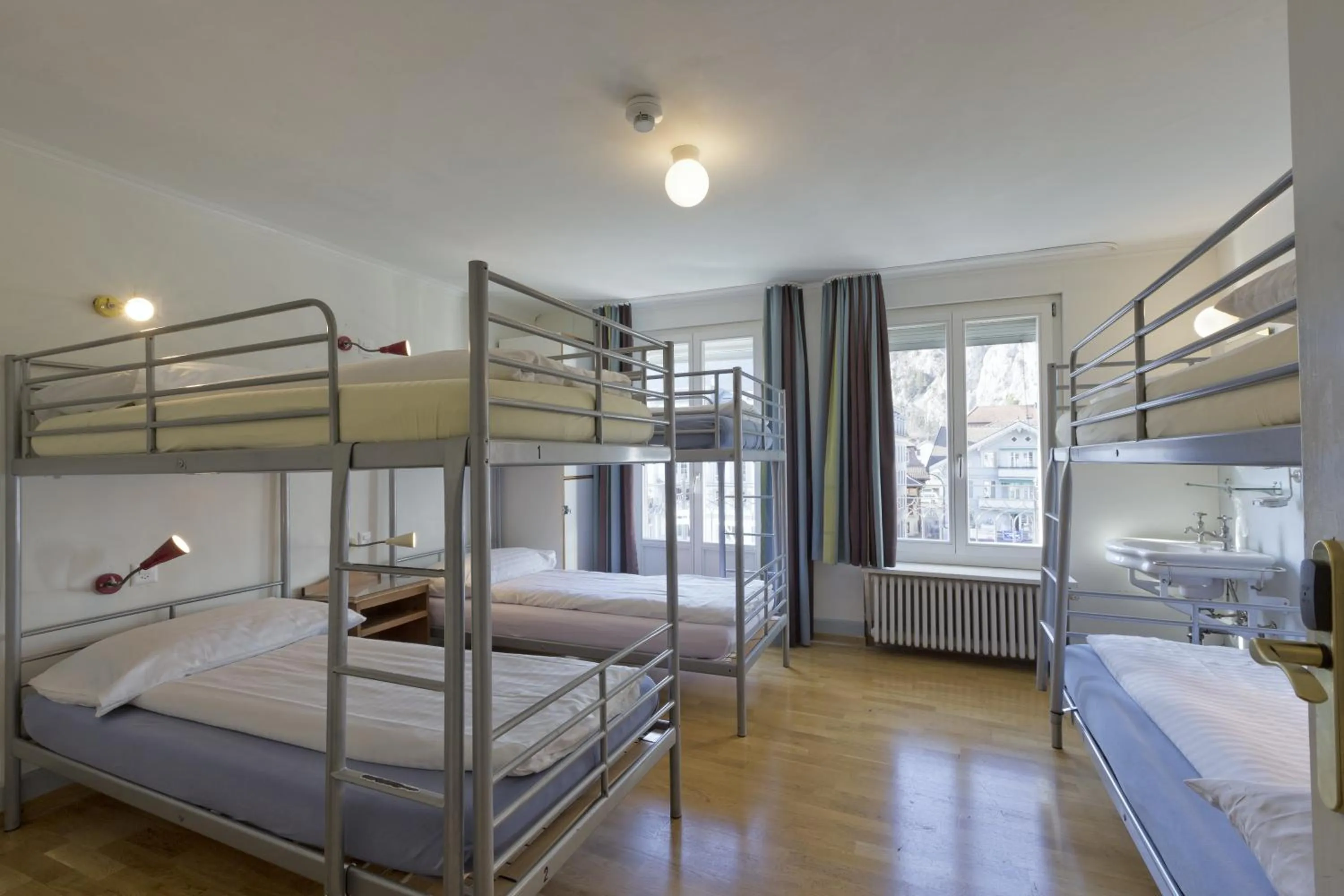 Single Bed in Mixed Dormitory Room with Shared Bathroom  in Alplodge