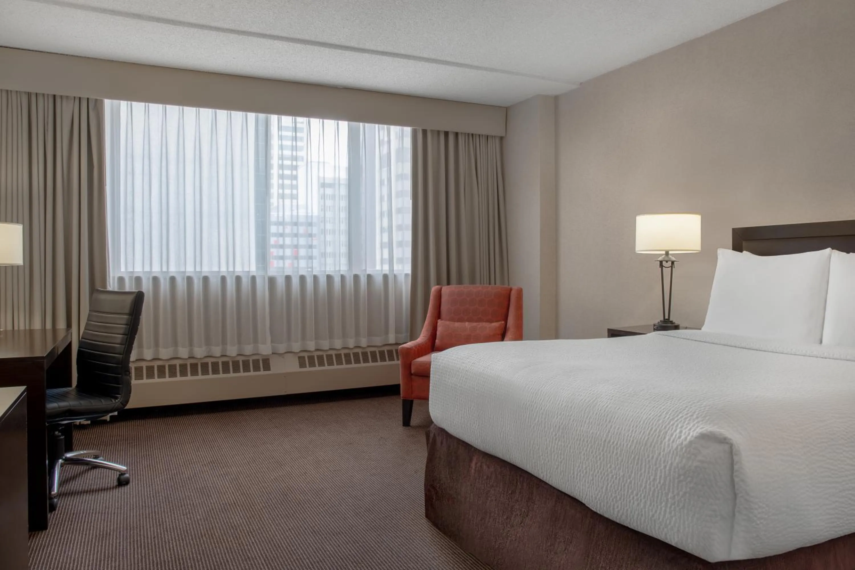 Queen Room with Balcony - Non-Smoking in Ramada Plaza by Wyndham Calgary Downtown