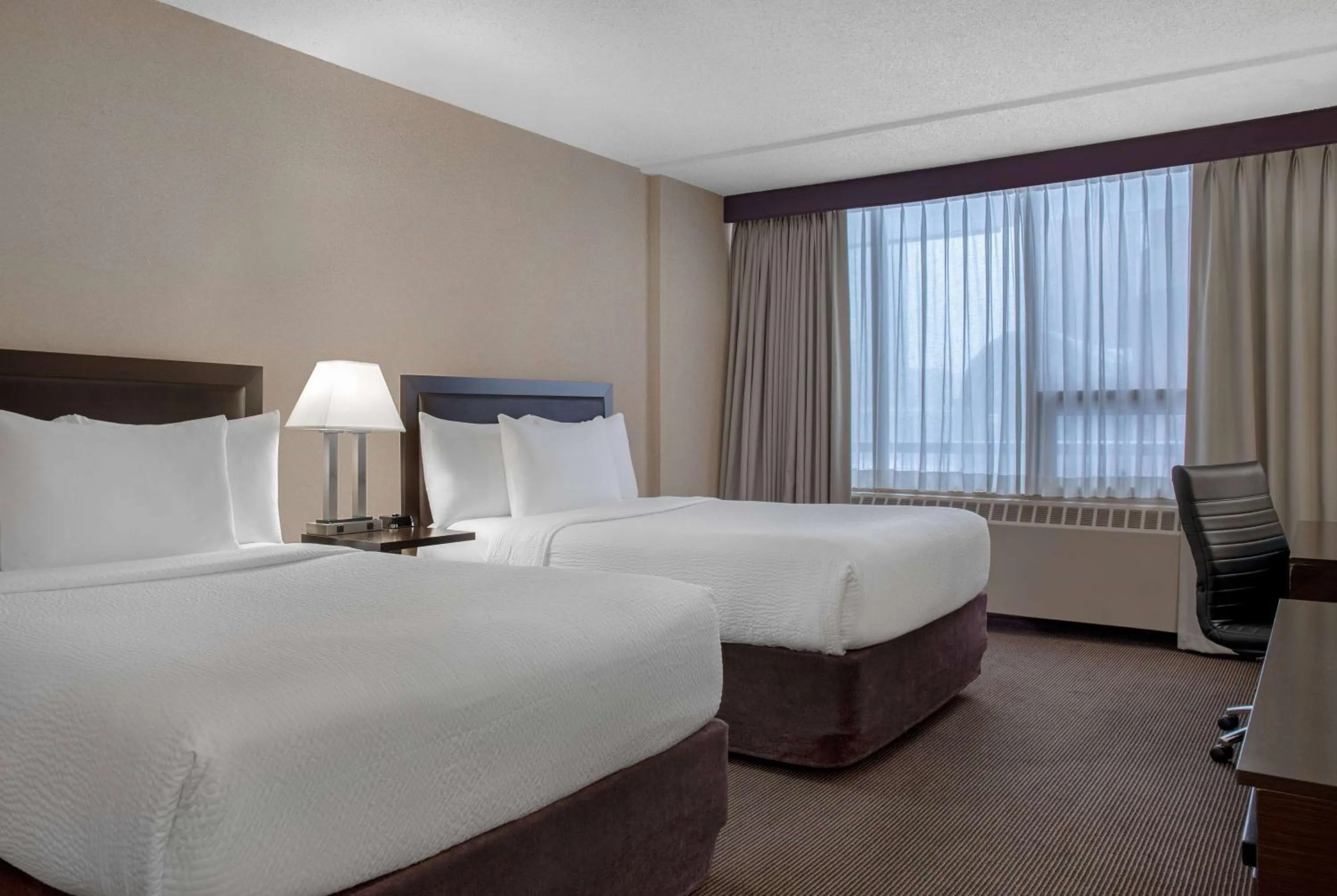 Double Room with Two Double Beds and Pool Access - Non-Smoking in Ramada Plaza by Wyndham Calgary Downtown
