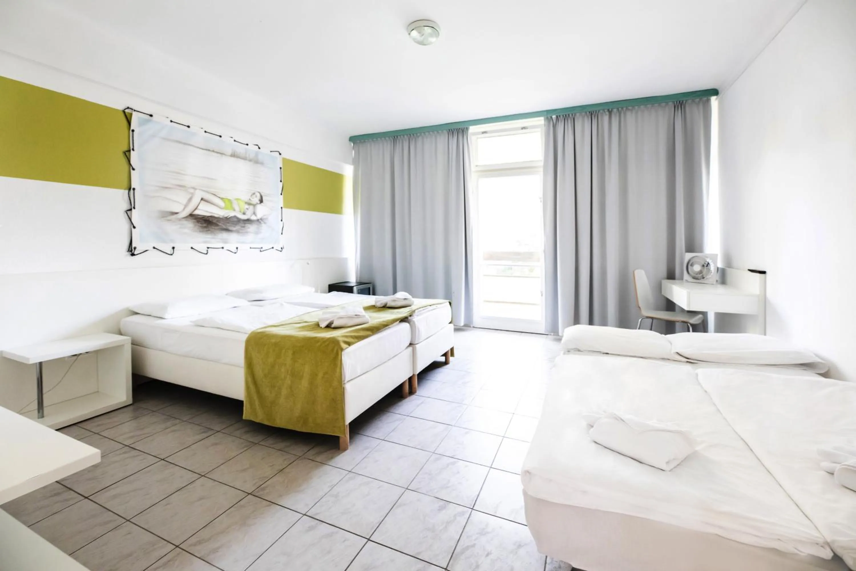 Family Room with Balcony in Hotel Holiday Csopak