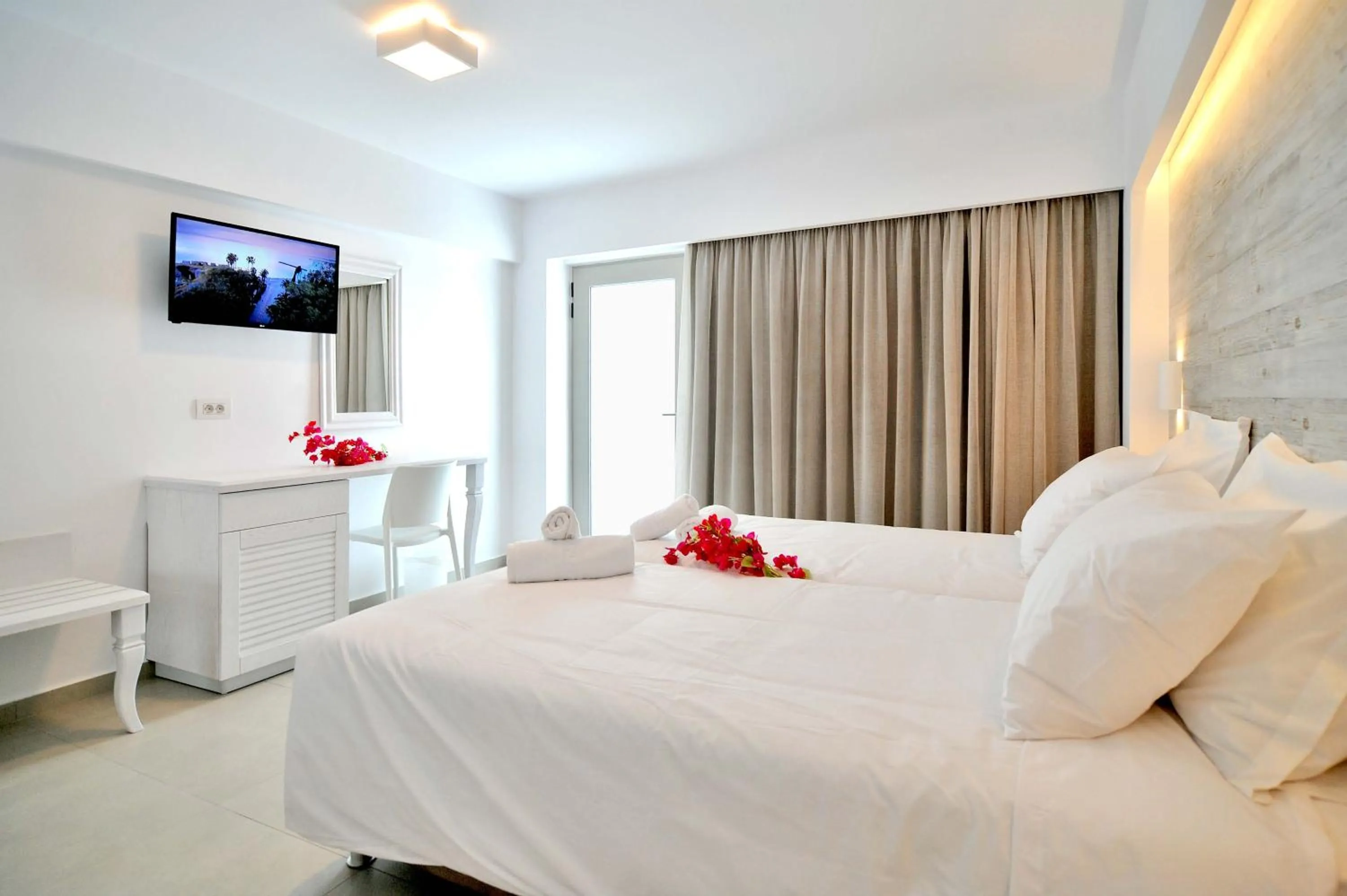 Deluxe Triple Room with Garden View in Apollon Windmill Boutique Hotel - Adults Only