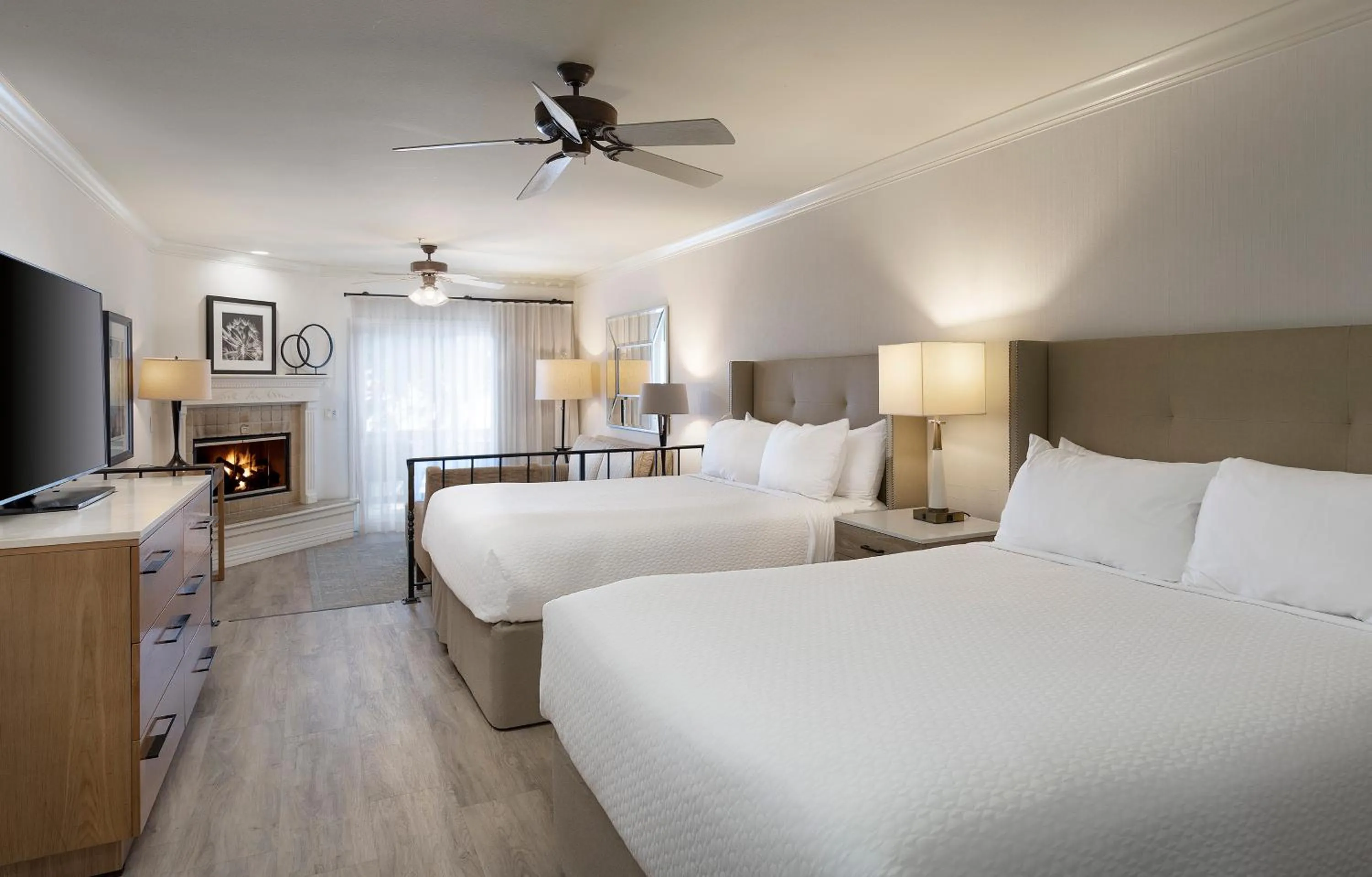 Queen Suite with Two Queen Beds and Partial Ocean View in Pelican Inn & Suites