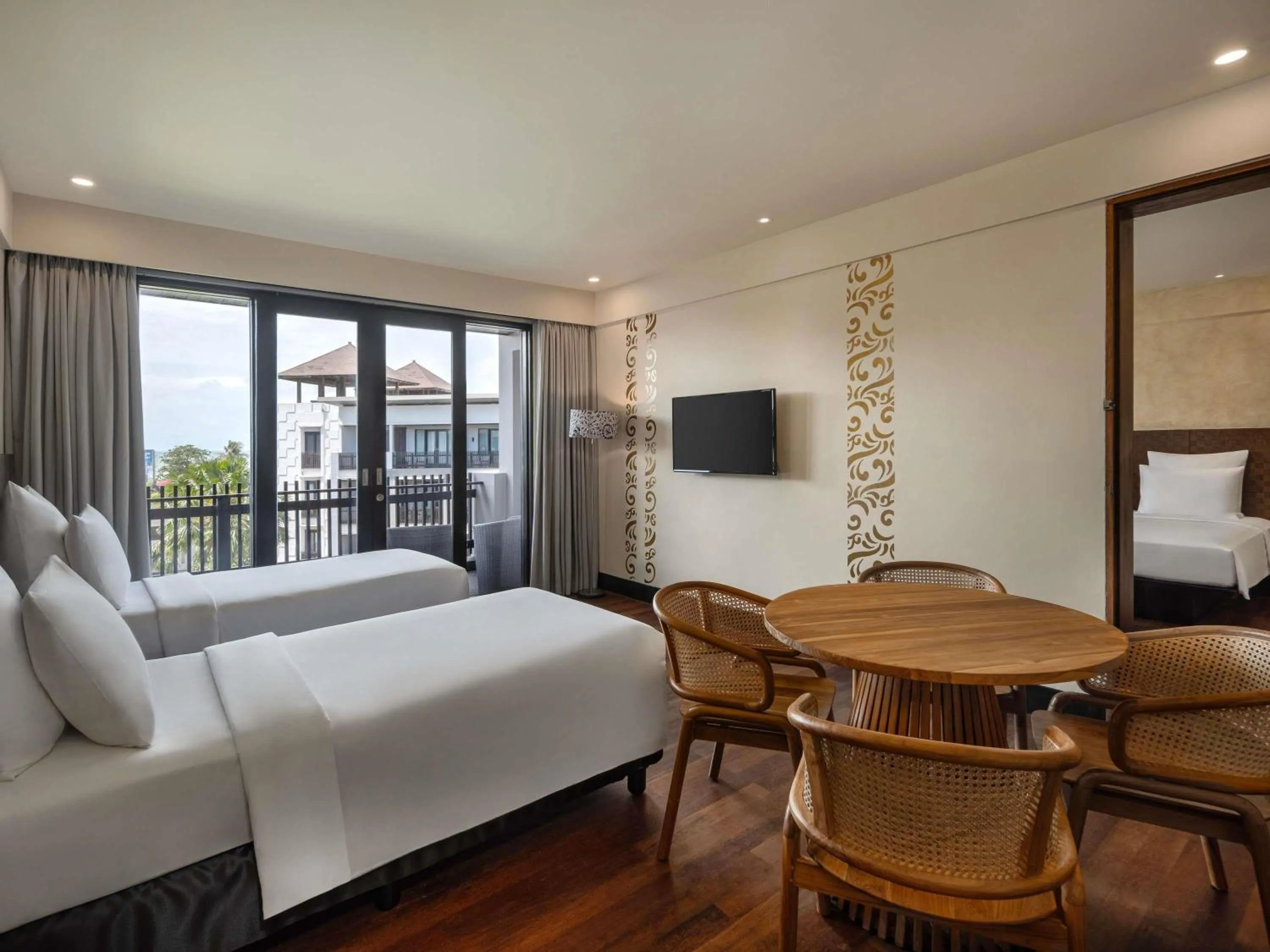 Junior Family Suite, 1 King Size Bed and 2 Single Beds, Garden View with Free Coffee Capsule Machine, Kids and Resort Activities in Pullman Bali Legian Beach