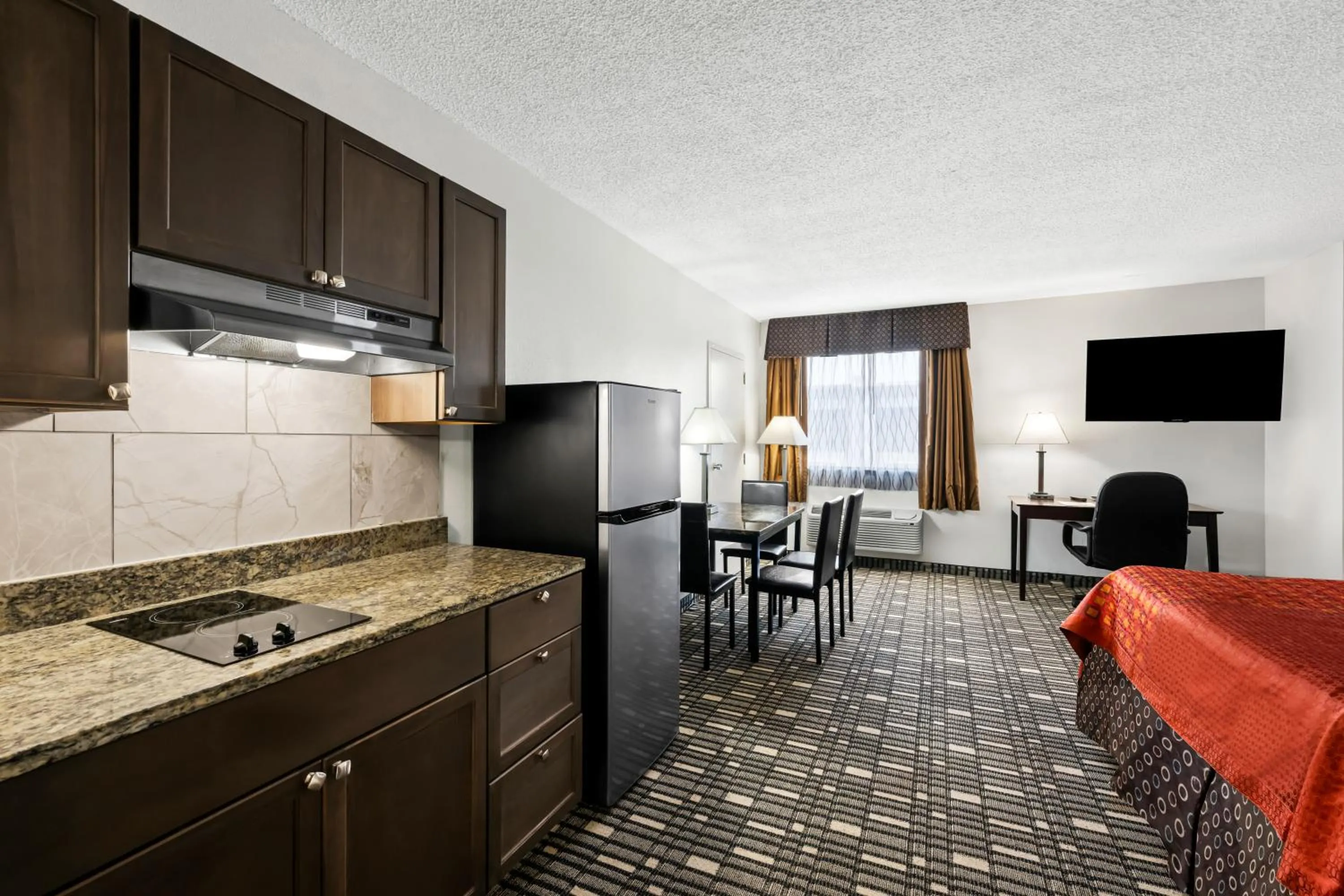 King Room with Kitchenette in SureStay Plus Hotel by Best Western Lubbock Medical Center