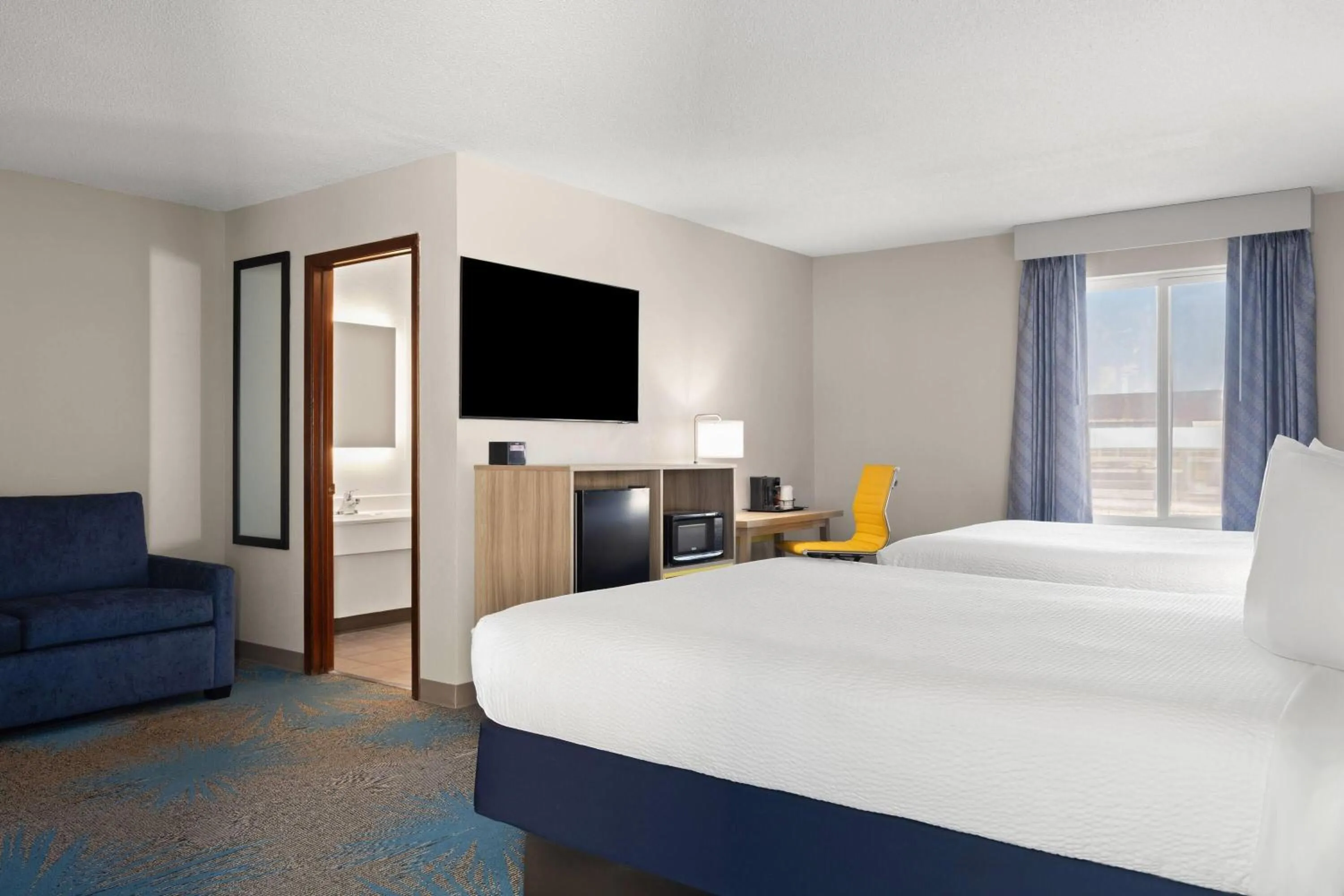 Deluxe Queen Room with Two Queen Beds - Non-Smoking in Days Inn by Wyndham Jamestown