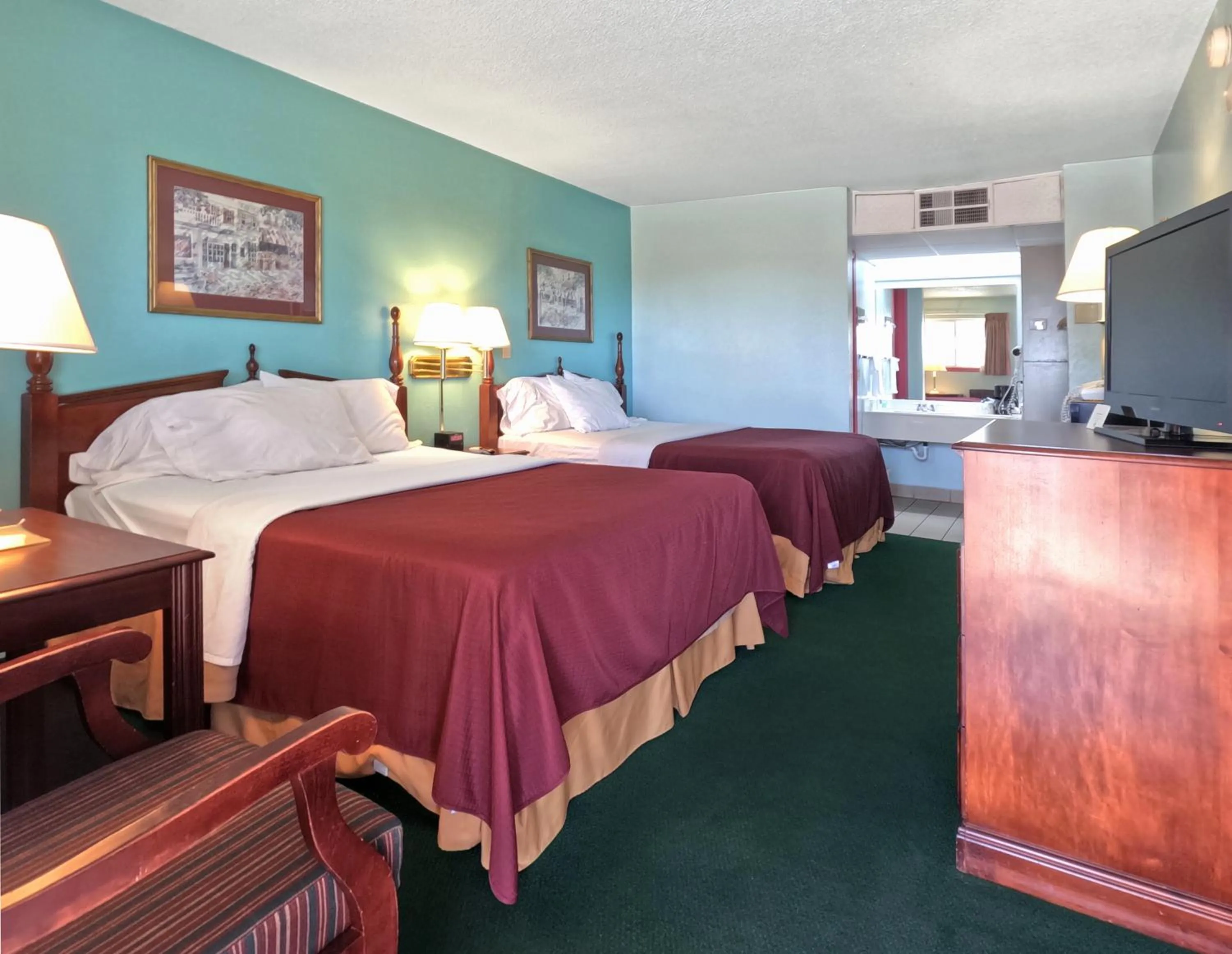 Queen Room with Two Queen Beds - Non-Smoking in Americas Best Value Inn & Suites Vega