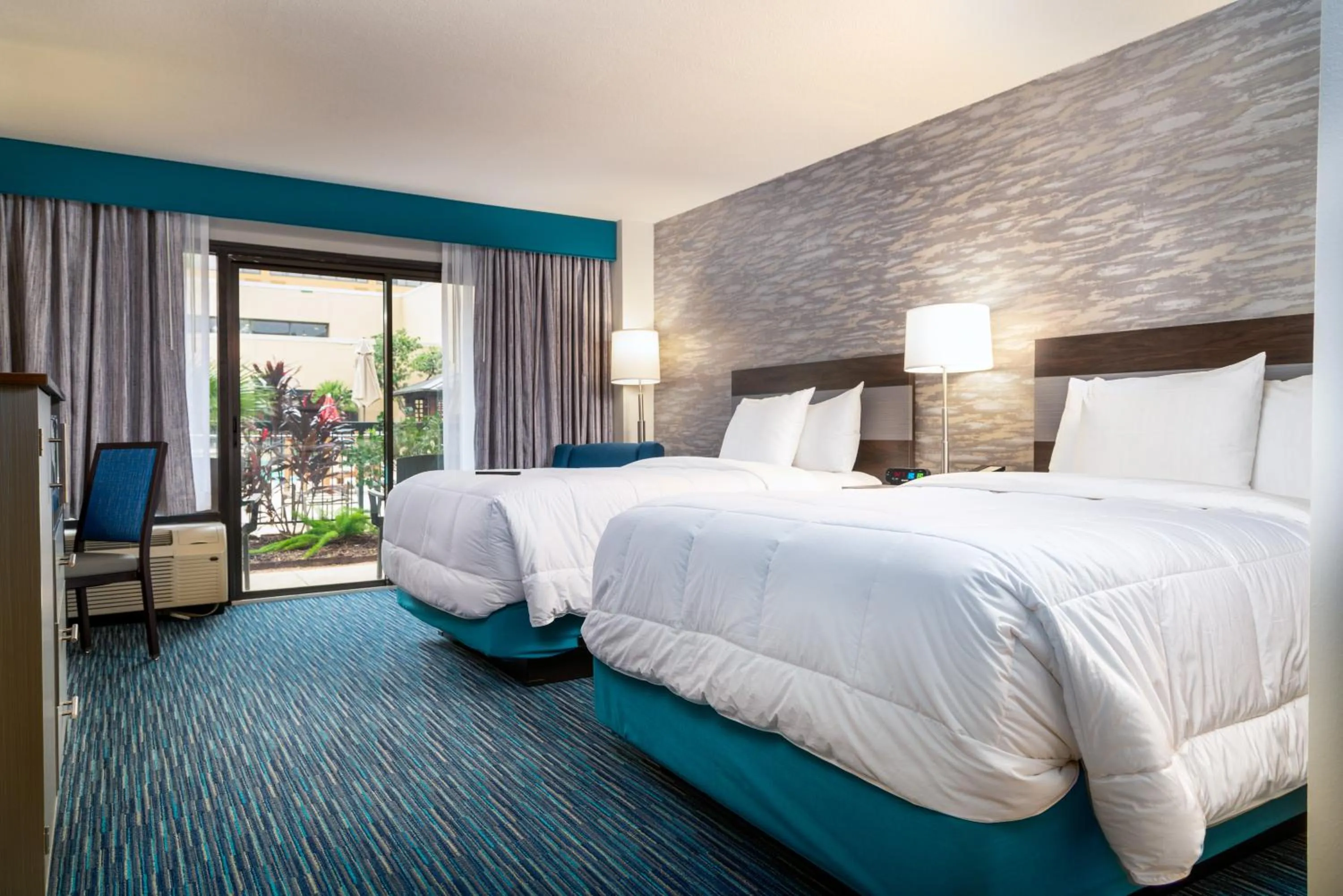 Double Room with Patio in MCM Eleganté Hotel & Conference Center