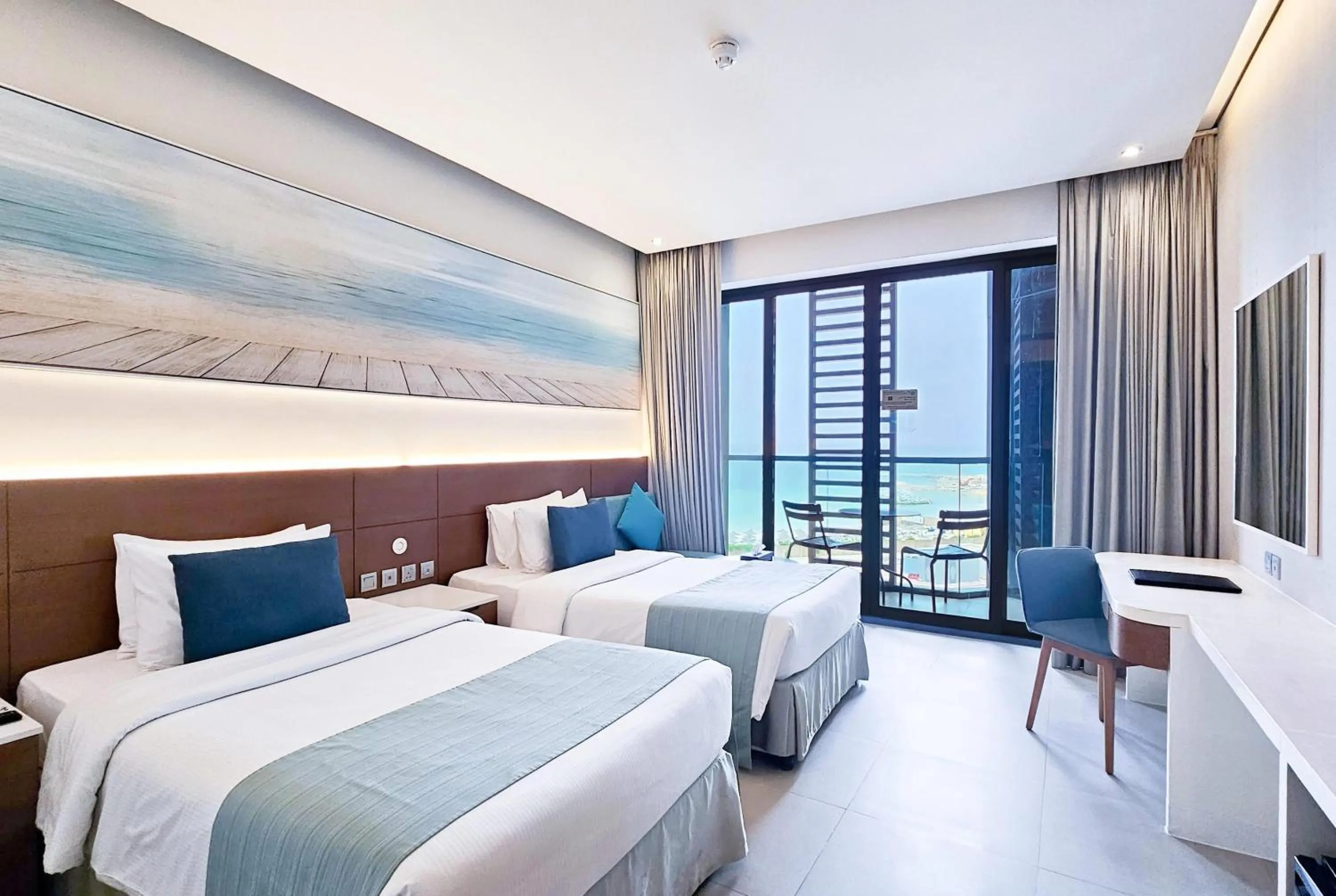Standard Twin room Mobility Access Seaview - Non Smoking in Wyndham Garden Ajman Corniche
