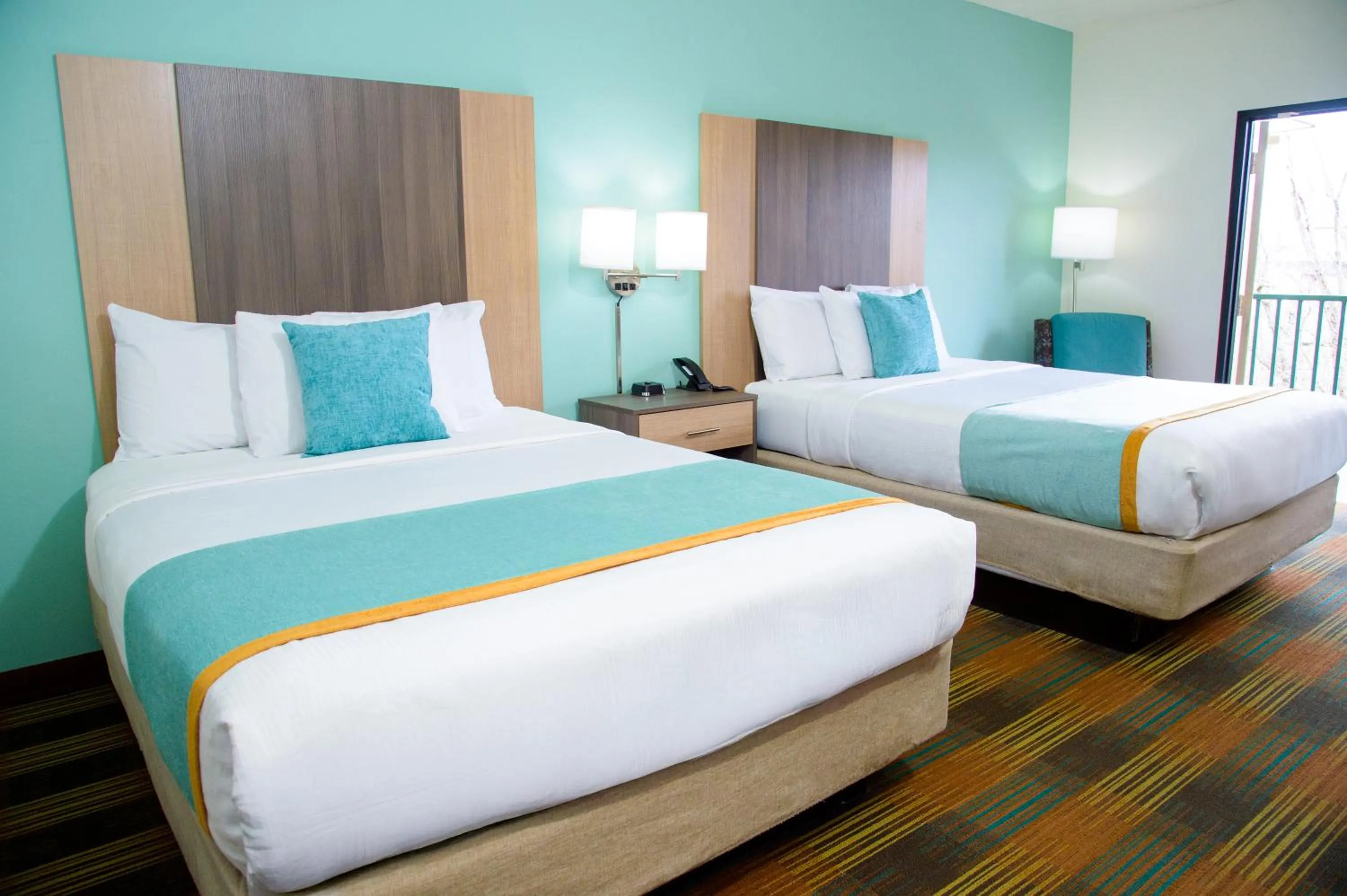 Queen Room with Two Queen Beds and Balcony in Pigeon River Inn