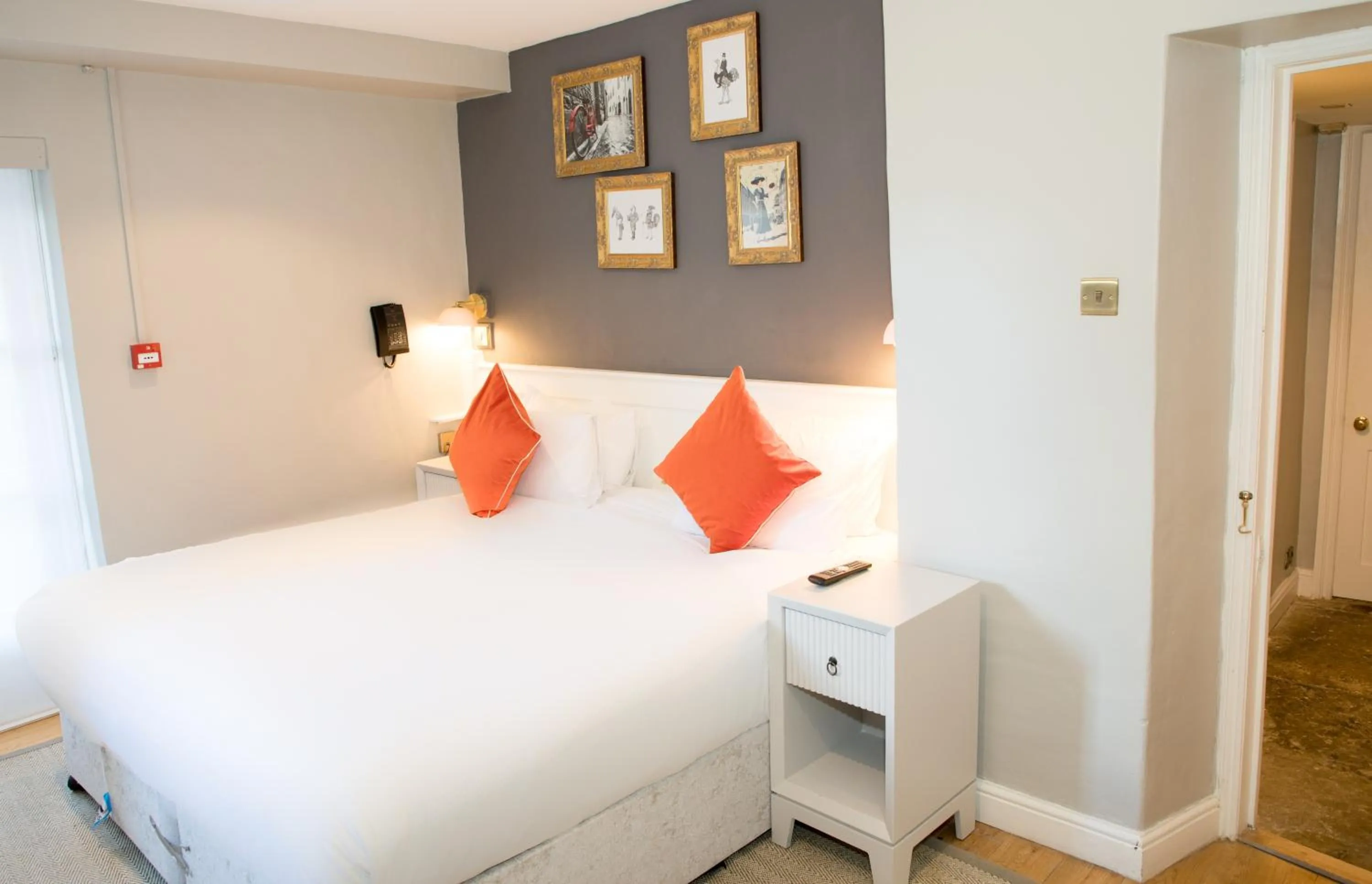 Traditional Family Room - Garden in Henrietta House, a member of Radisson Individuals