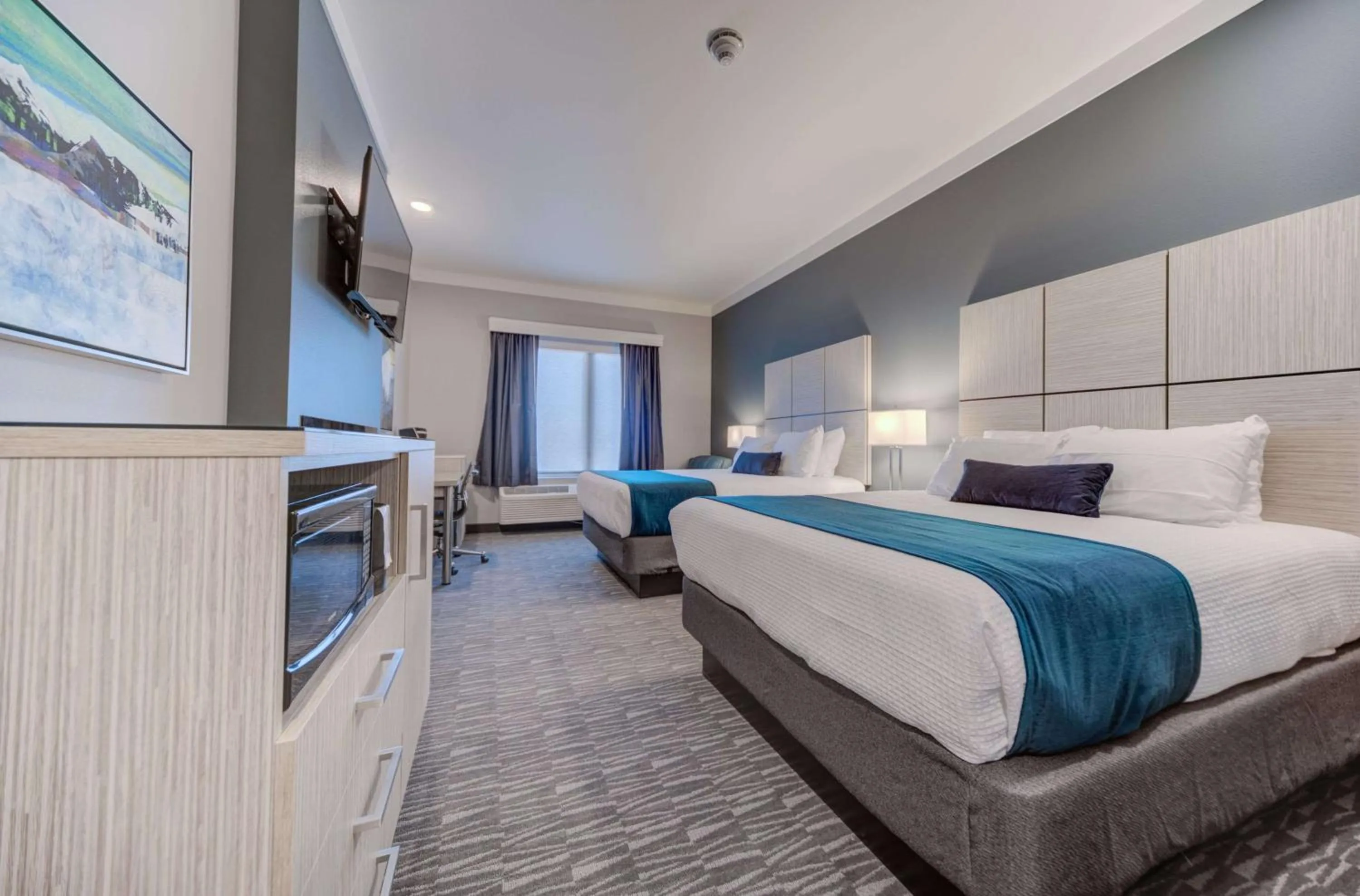 Queen Room with Two Queen Beds and Fireplace  - Non-Smoking in Hotel Peppertree Bend, BW Premier Collection
