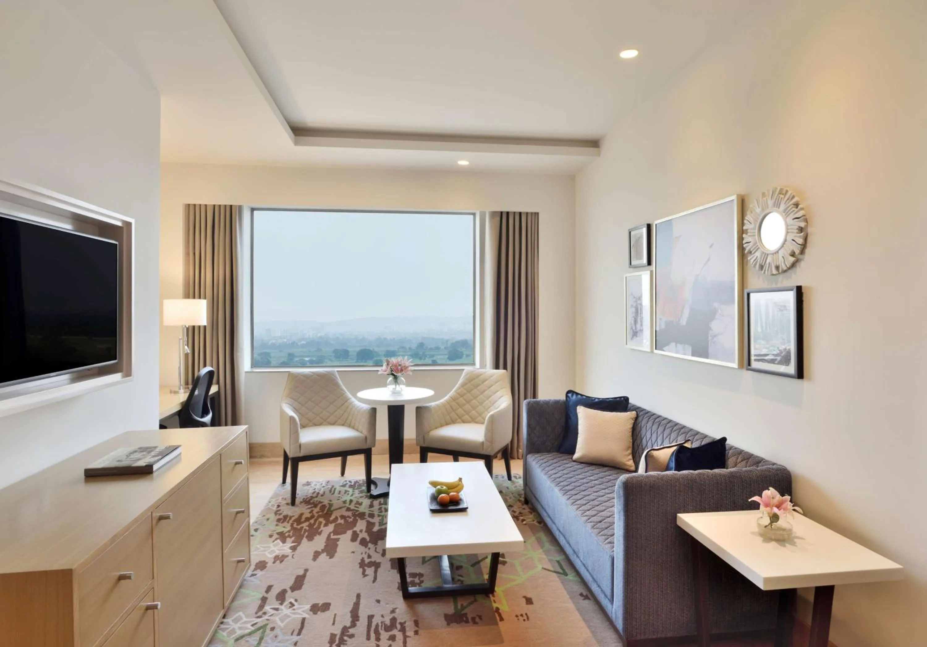Executive Suite with 20% Discount on Food & Beverages, Complimentary 2 Soft drinks at BAR, 20% Discount on SPA, Early Check-in by 11 AM & Late check-out by 3 PM (Subject to availability), Two Way Airport Transfers & 4 Pieces Laundry  in Radisson Gurugram Udyog Vihar