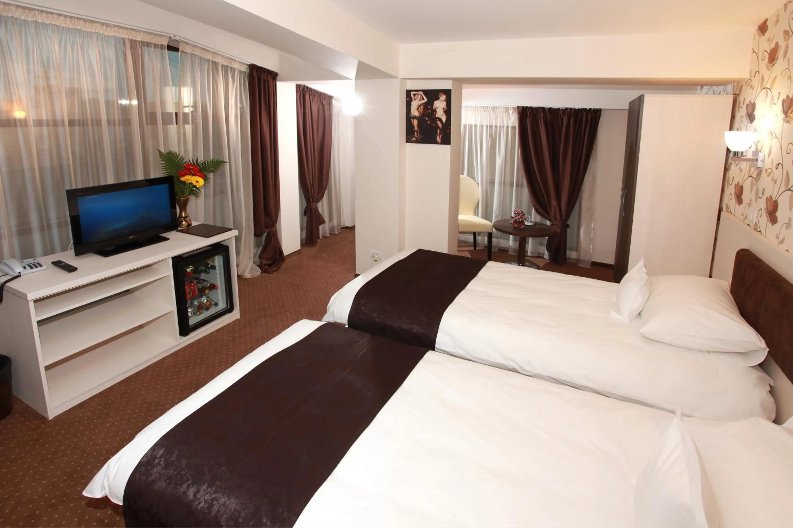 Bed in West Plaza Hotel