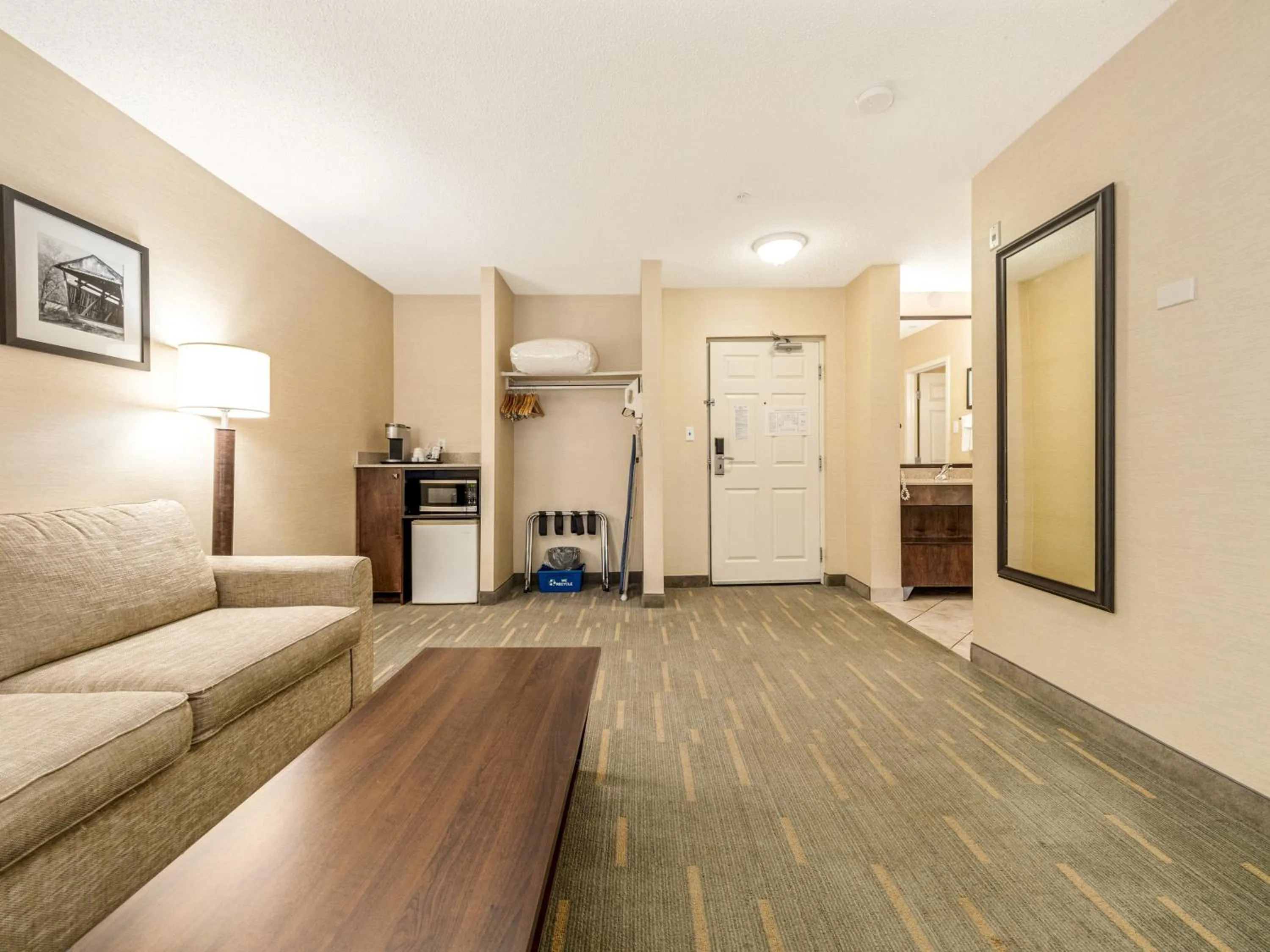 One-Bedroom Suite with Three Queen and One Sofa Bed - Pool View in Holiday Inn Lethbridge by IHG