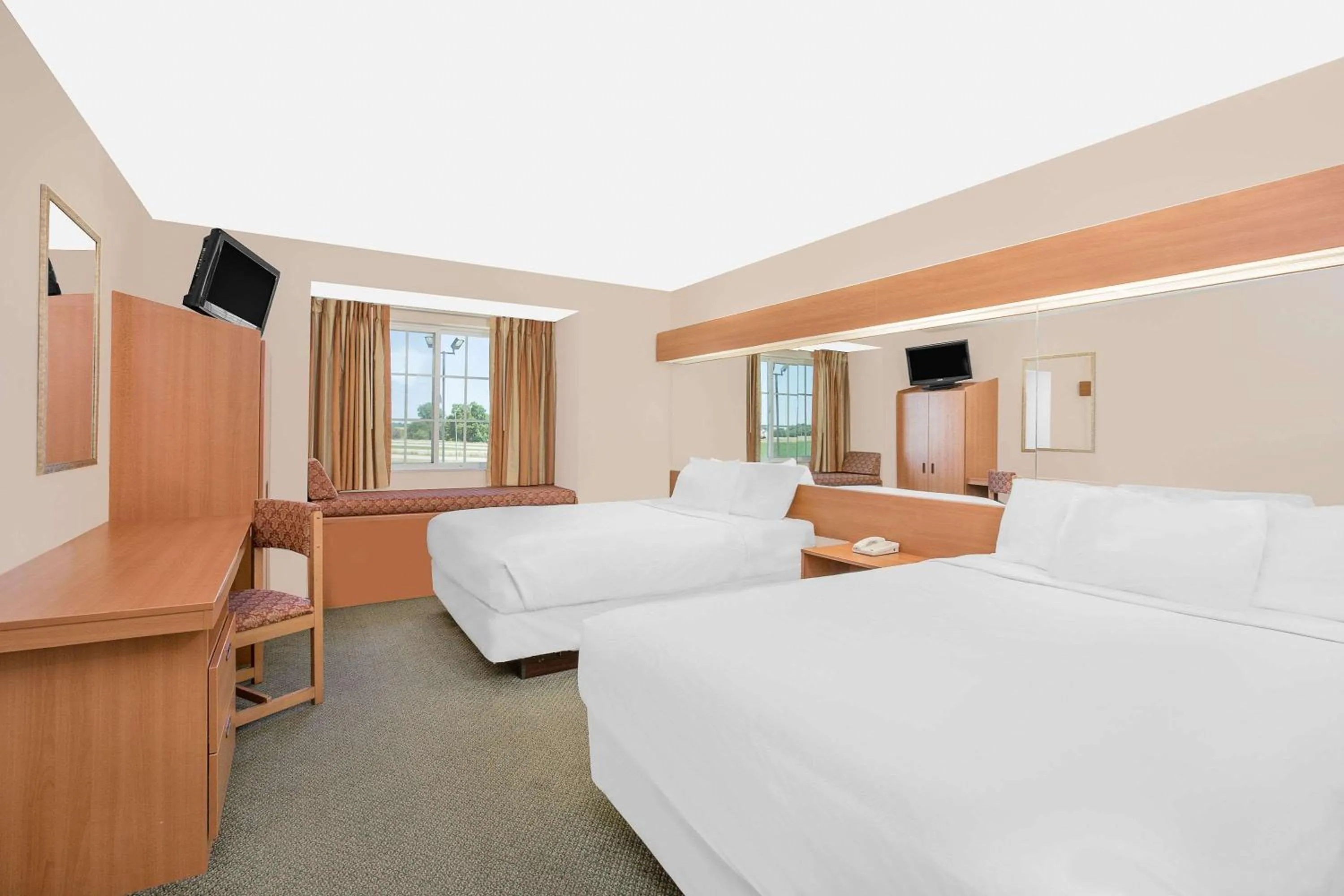 Deluxe Business Queen Room with Two Queen Beds - Non-Smoking in Microtel Inn & Suites by Wyndham Colfax