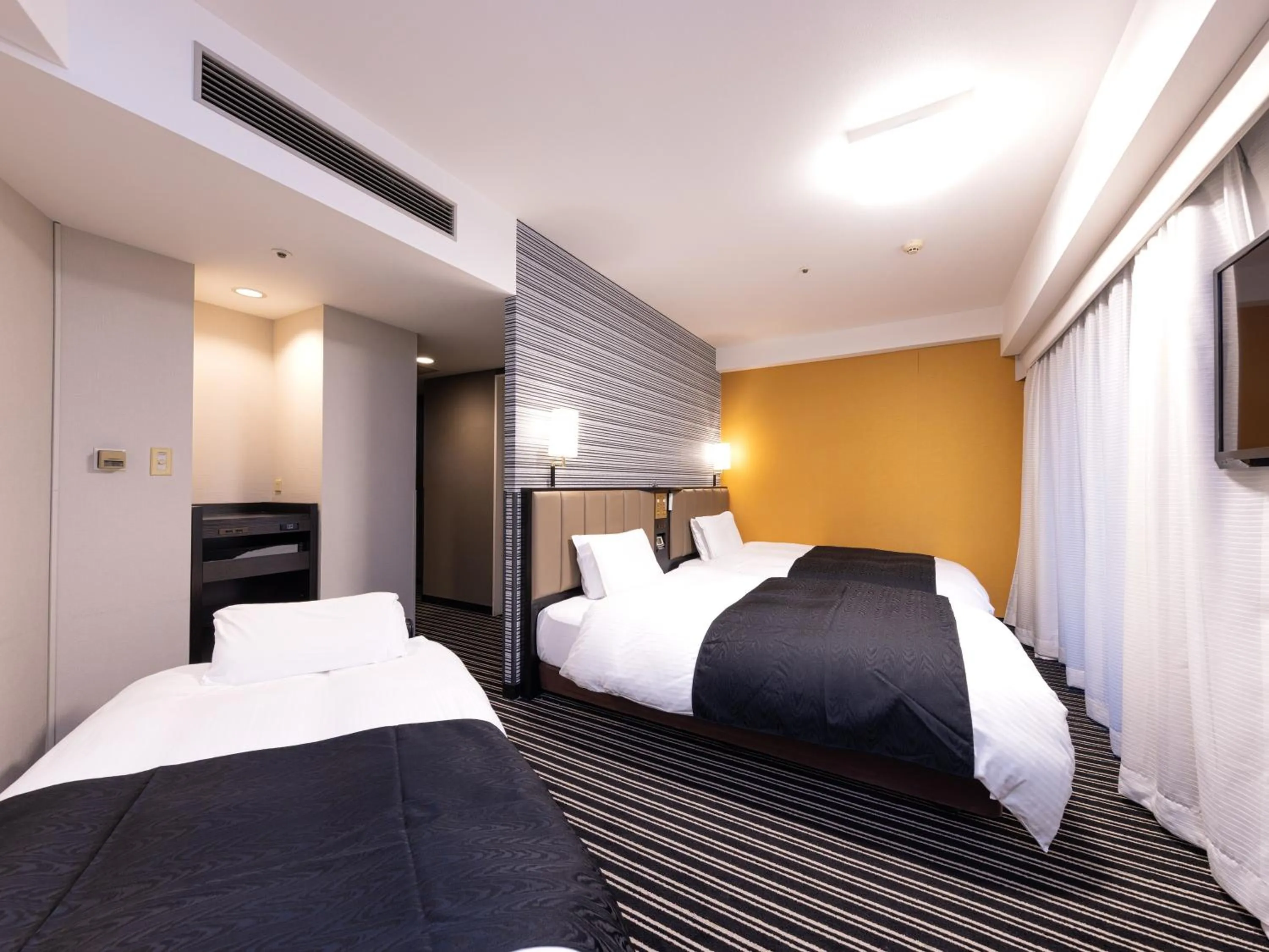 Standard Twin Room with Sofa Bed - Non-Smoking in APA Hotel Fukuoka Watanabedori Ekimae EXCELLENT