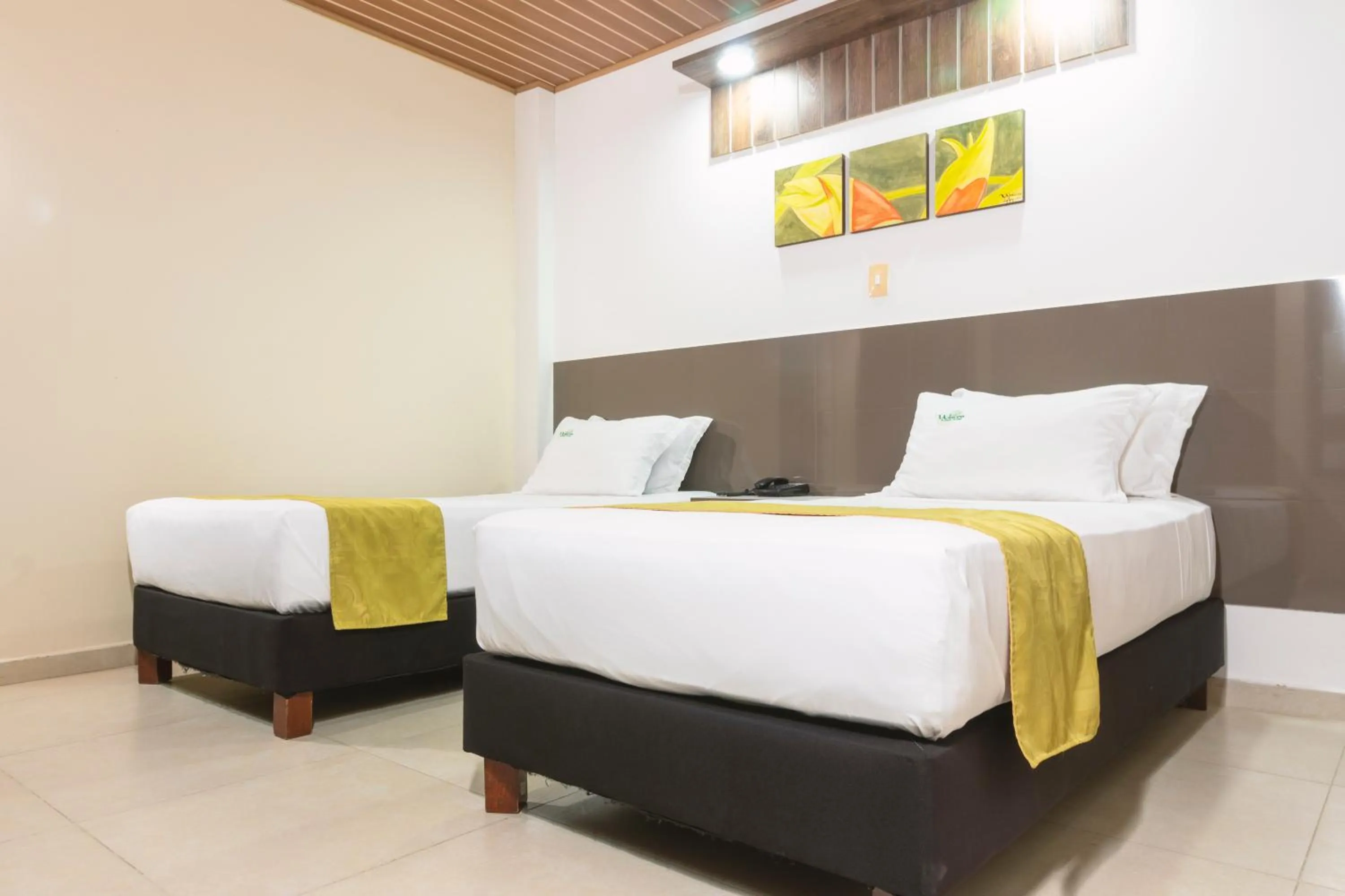 Bed in Waira Suites
