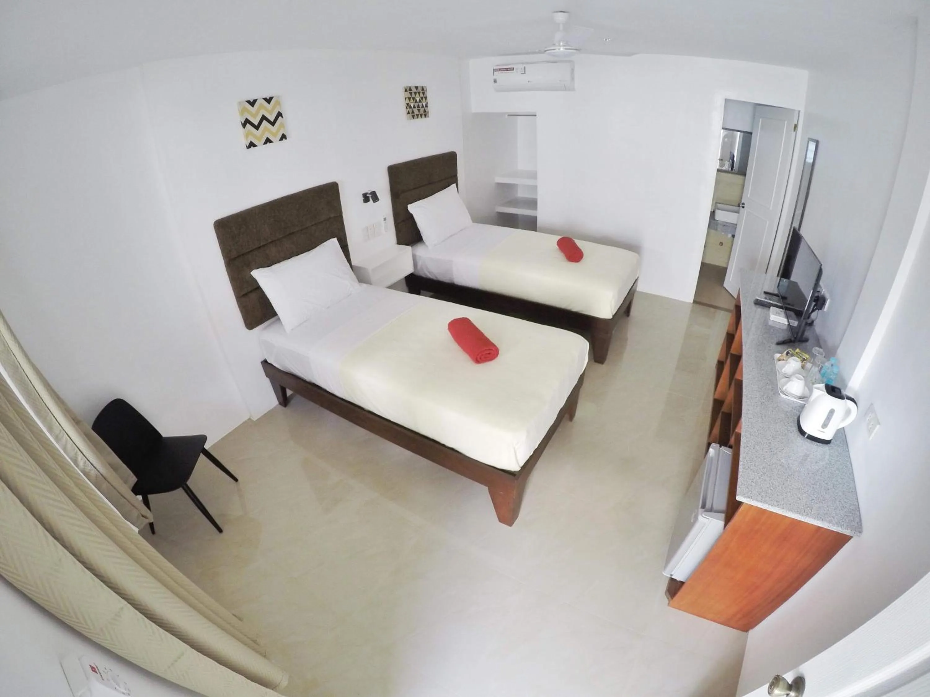 Deluxe Twin Room in Heartland Hotel Serviced Rooms & Apartments.