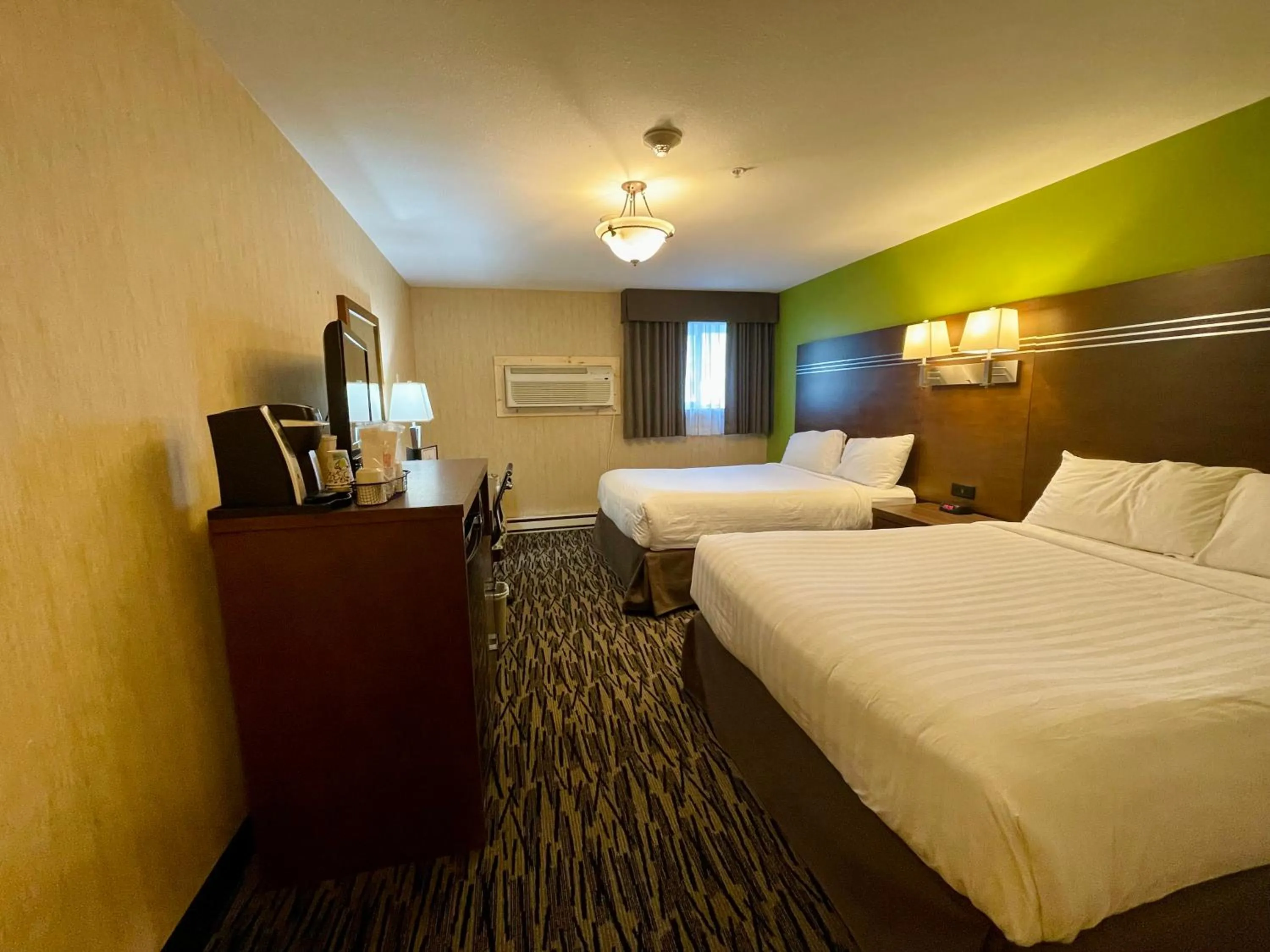 Queen Room with Two Queen Beds - No Patio - On Basement Level - Pet Friendly in Fernie Stanford Resort