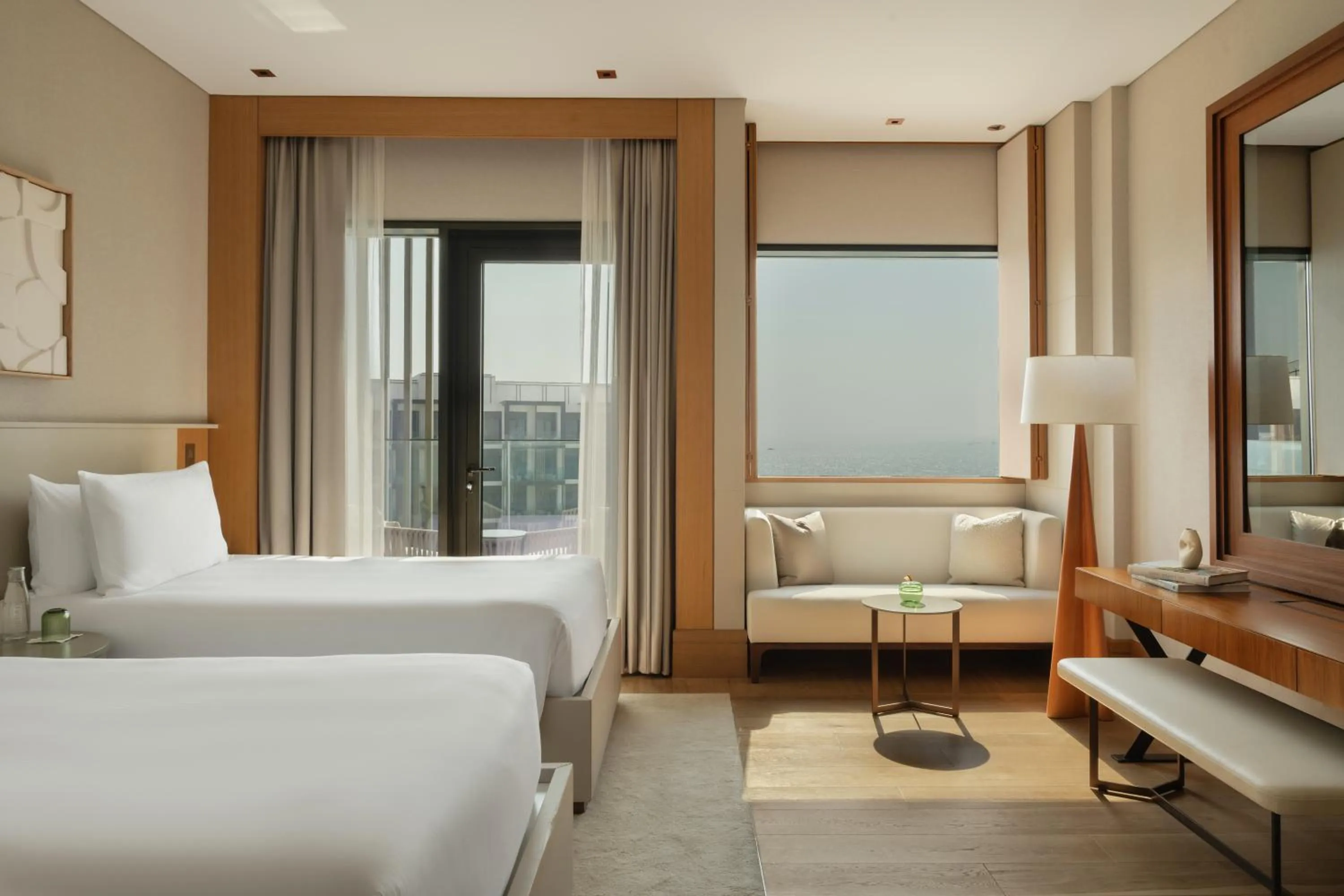 Rising Light Twin Guest Room with Balcony and Resort View in Delano Dubai at Bluewaters