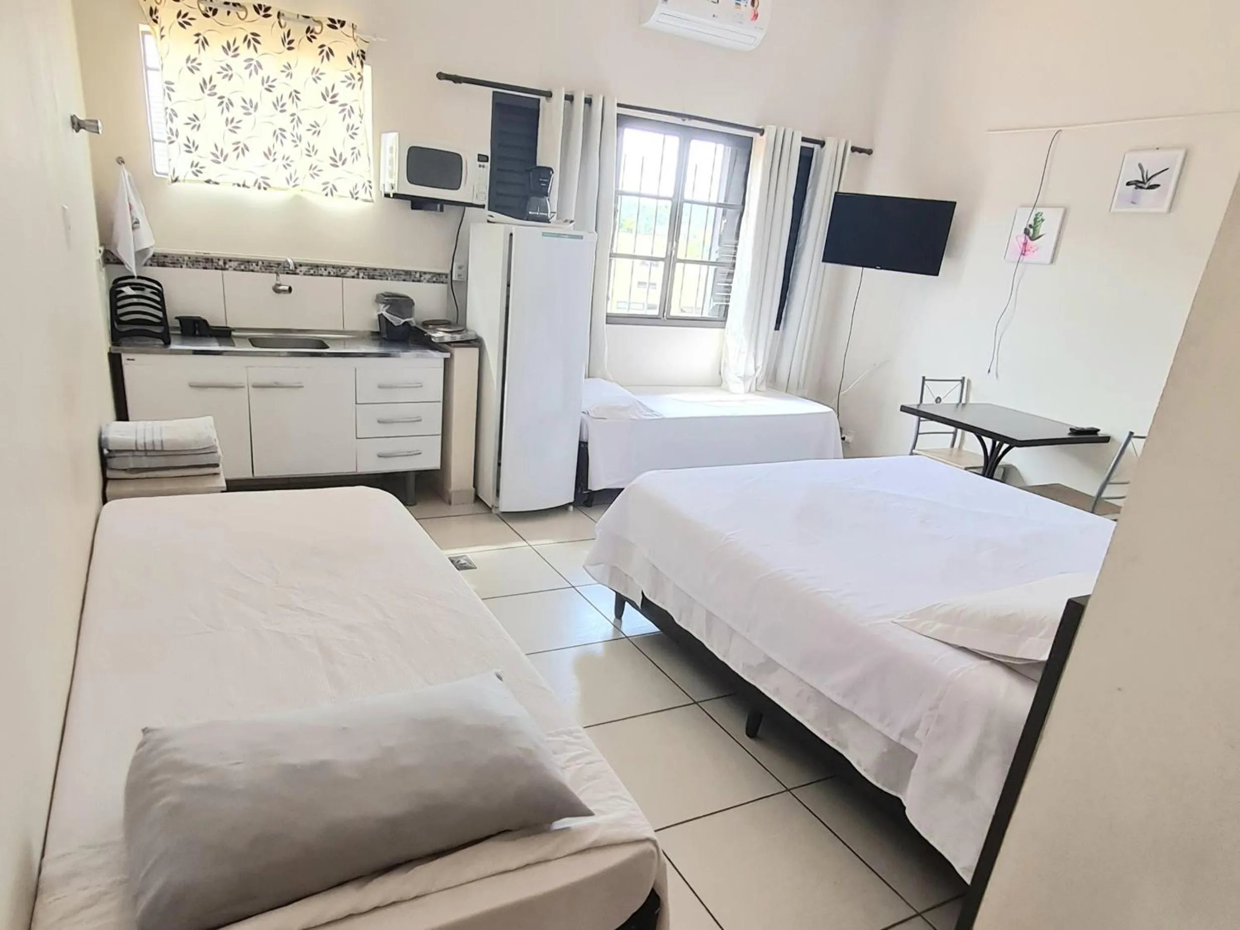 Quadruple Room - single occupancy in Acqua Flats Jaguariúna