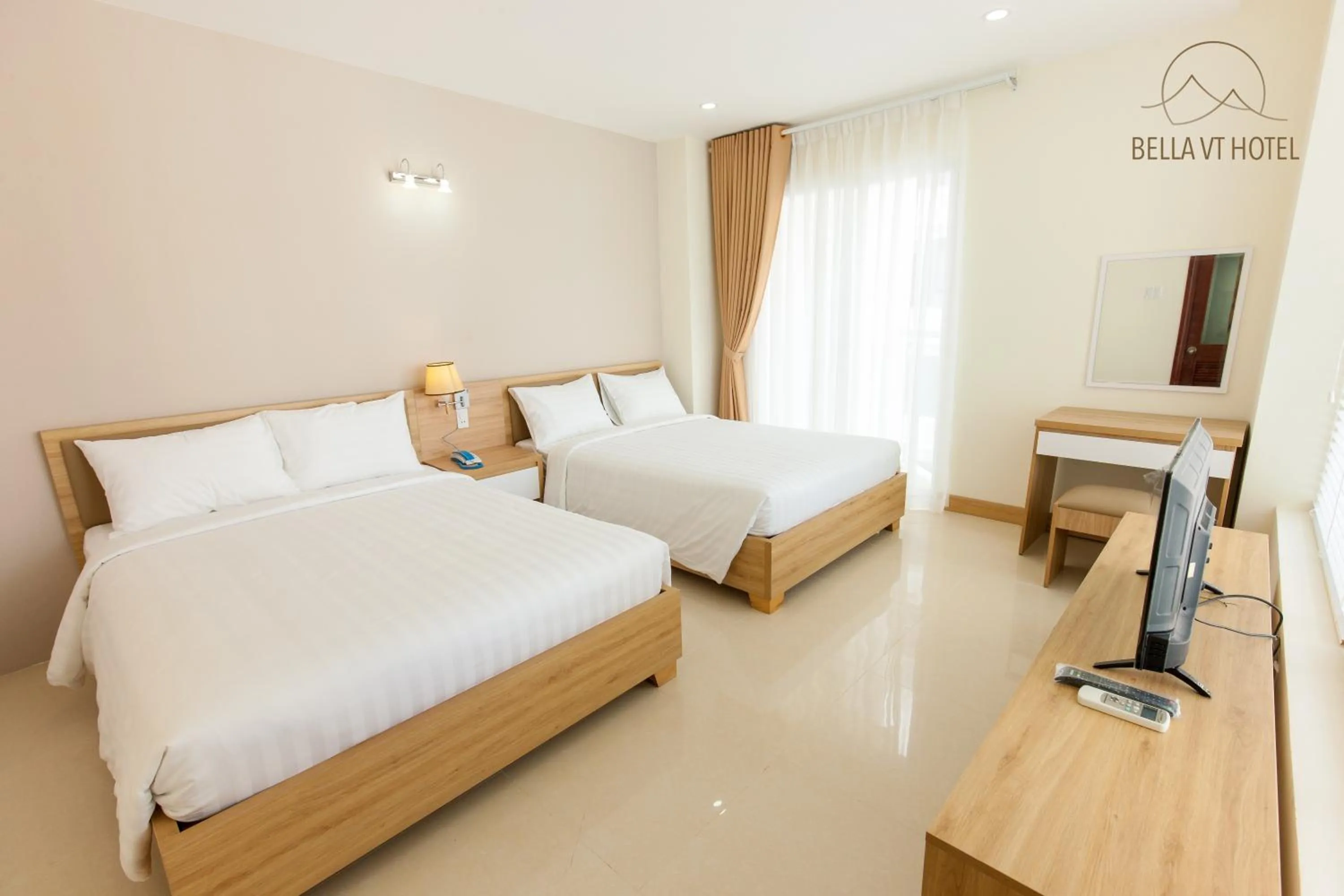 Quadruple Room with Balcony in BELLA VT HOTEL