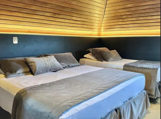 Luxury Triple Room in Hotel Glamour da Serra