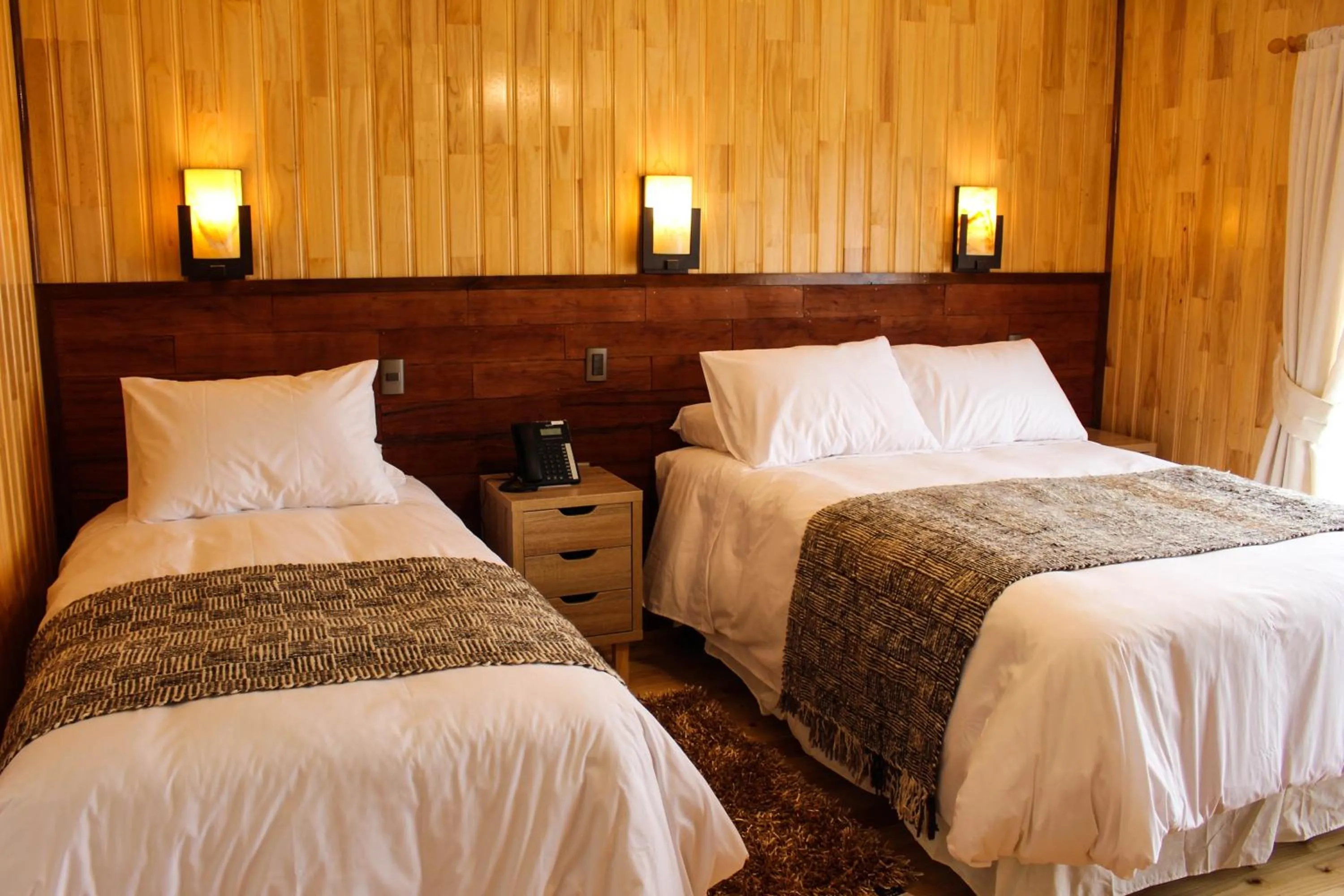 Superior Triple Room with Sea View in Hotel Aliwen