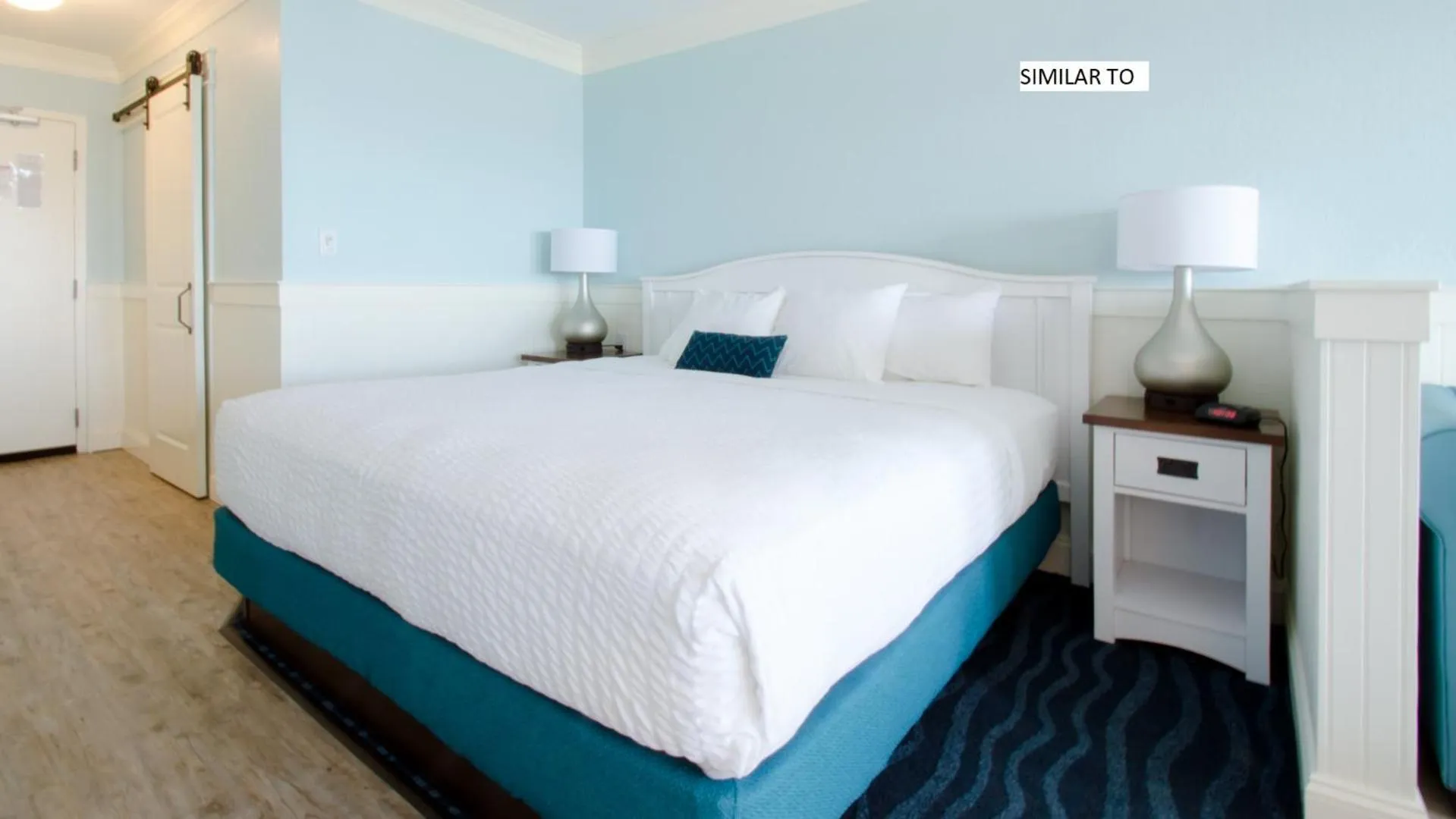 Deluxe - 1 King Bed Side View - 4 Seasons - No Pets in John Yancey Oceanfront Inn