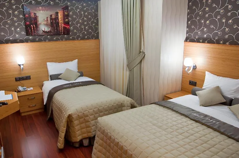 Standard Triple Room in Abel Hotel