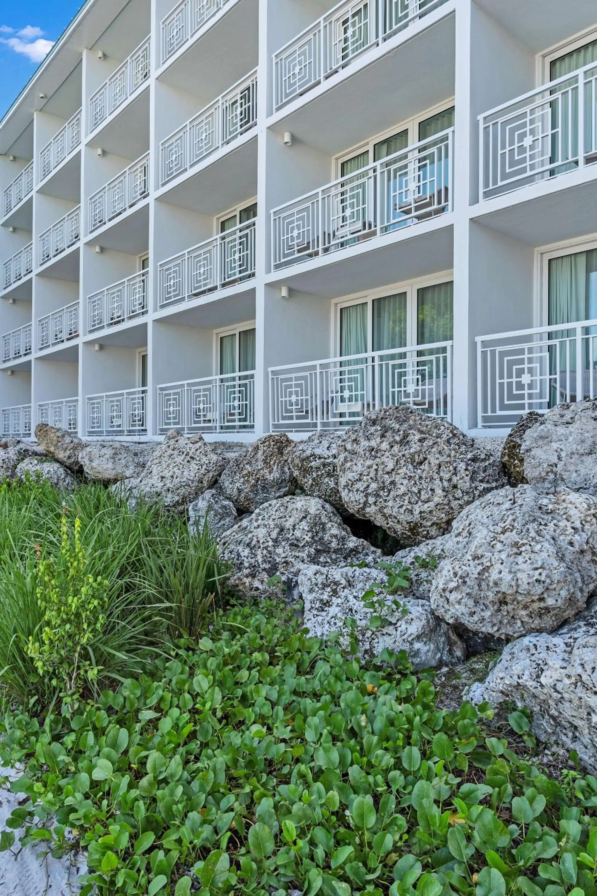 King Waterfront Room with Terrace - Coconut Wing in Baker's Cay Resort Key Largo, Curio Collection By Hilton