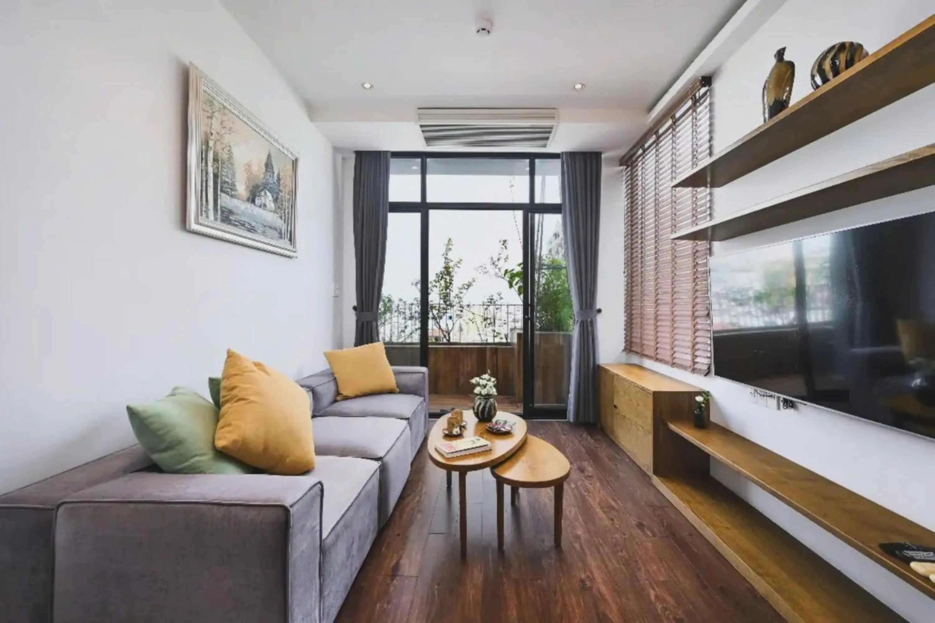 Two-Bedroom Family Suite, Bathtub, Kitchen and Balcony with Street & City View in The Bloom Pham Viet Chanh - Modern Living Space in Saigon - A Top Choice for Western Travelers