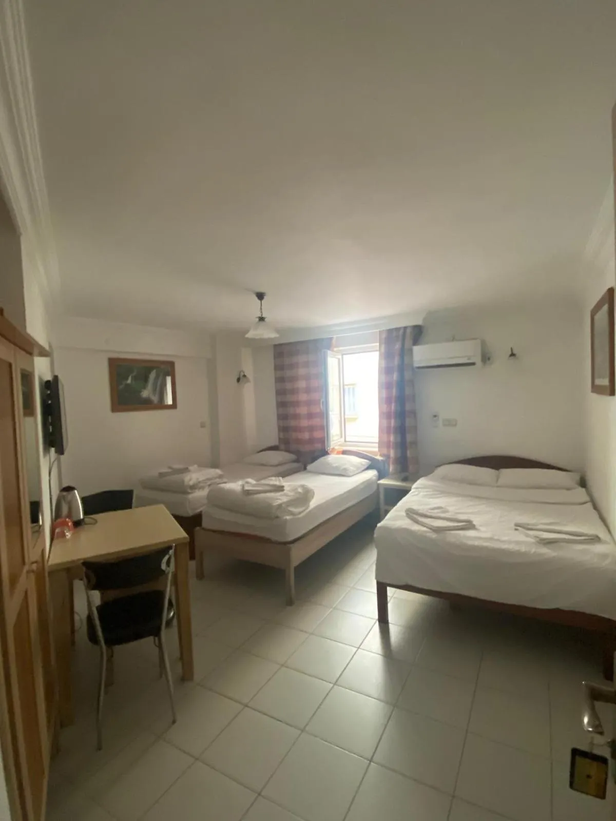 Economy Triple Room with Shared Bathroom in AY OTEL 2