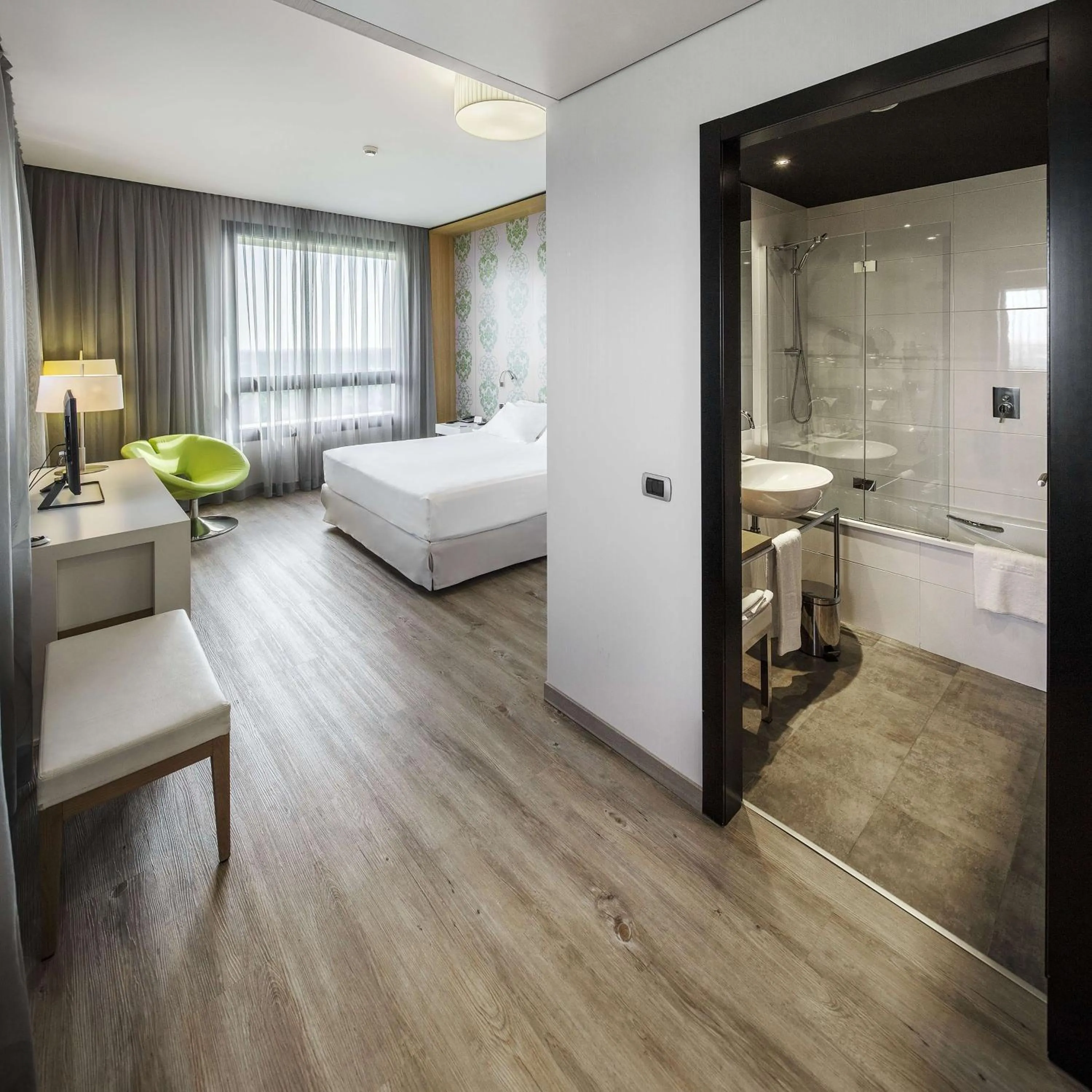 Junior Suite with Extra Bed (2 Adults + 1 Child) in NH Milano Fiera