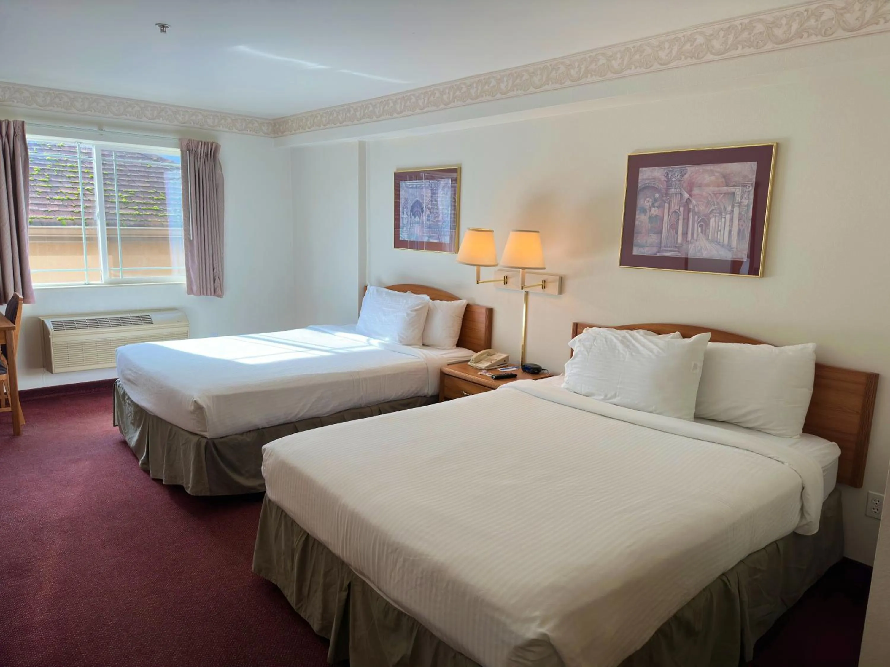 Queen Room with Two Queen Beds - Non-Smoking in Peppermill Empress Inn